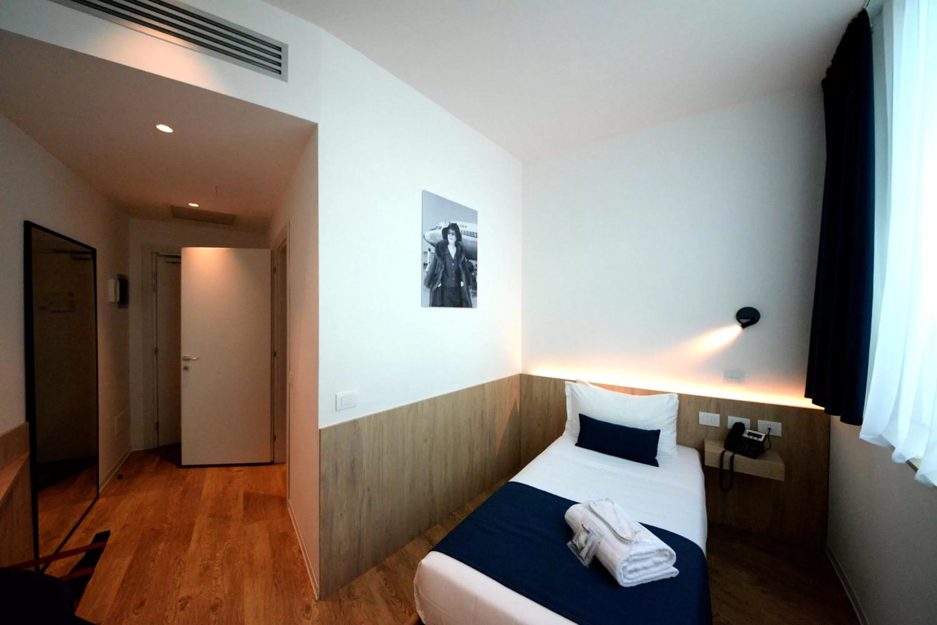 Bedroom, Bed in Air Rooms Rome Airport by HelloSky