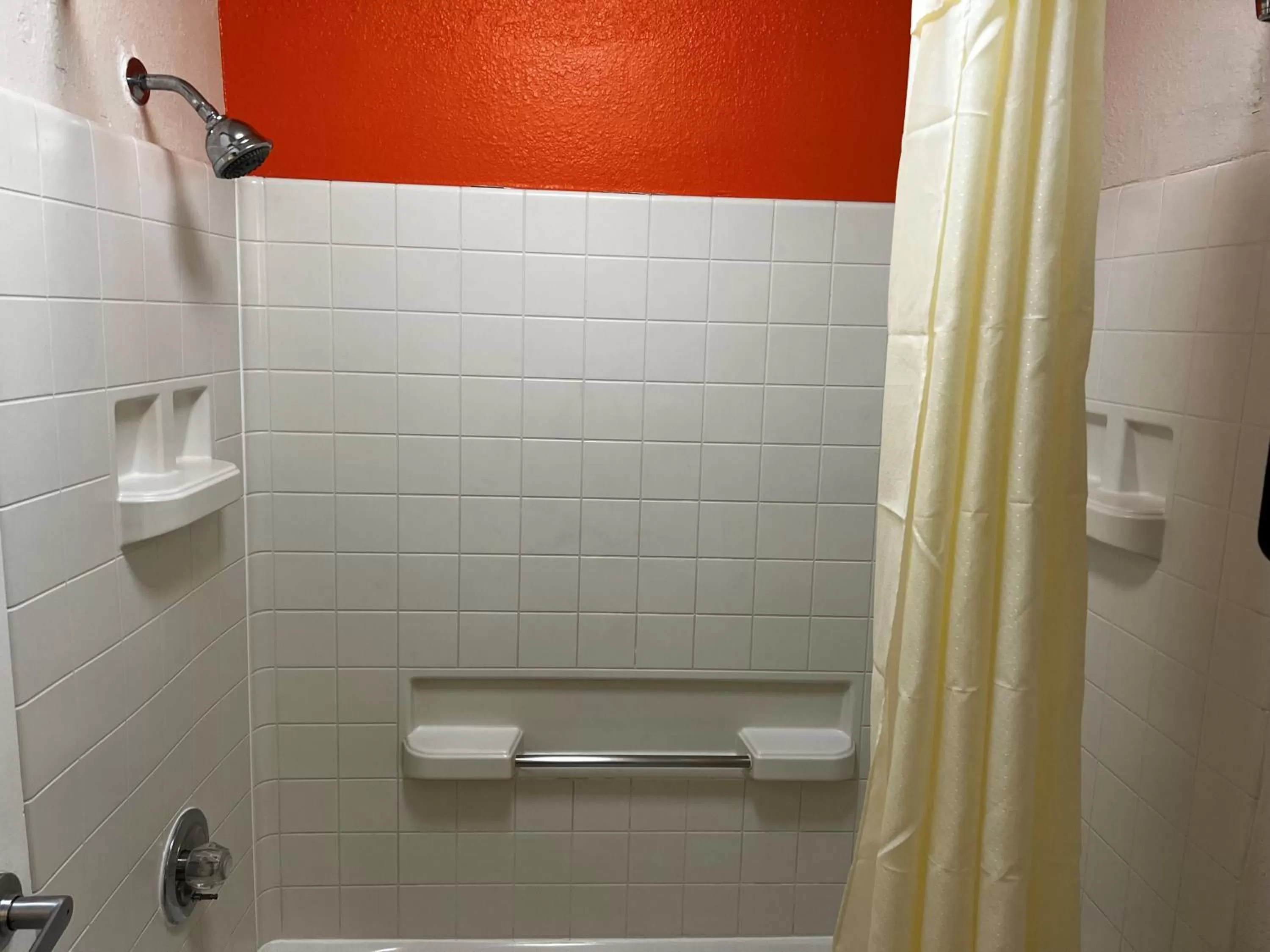 Shower in Howard Johnson by Wyndham Houston Heights Downtown