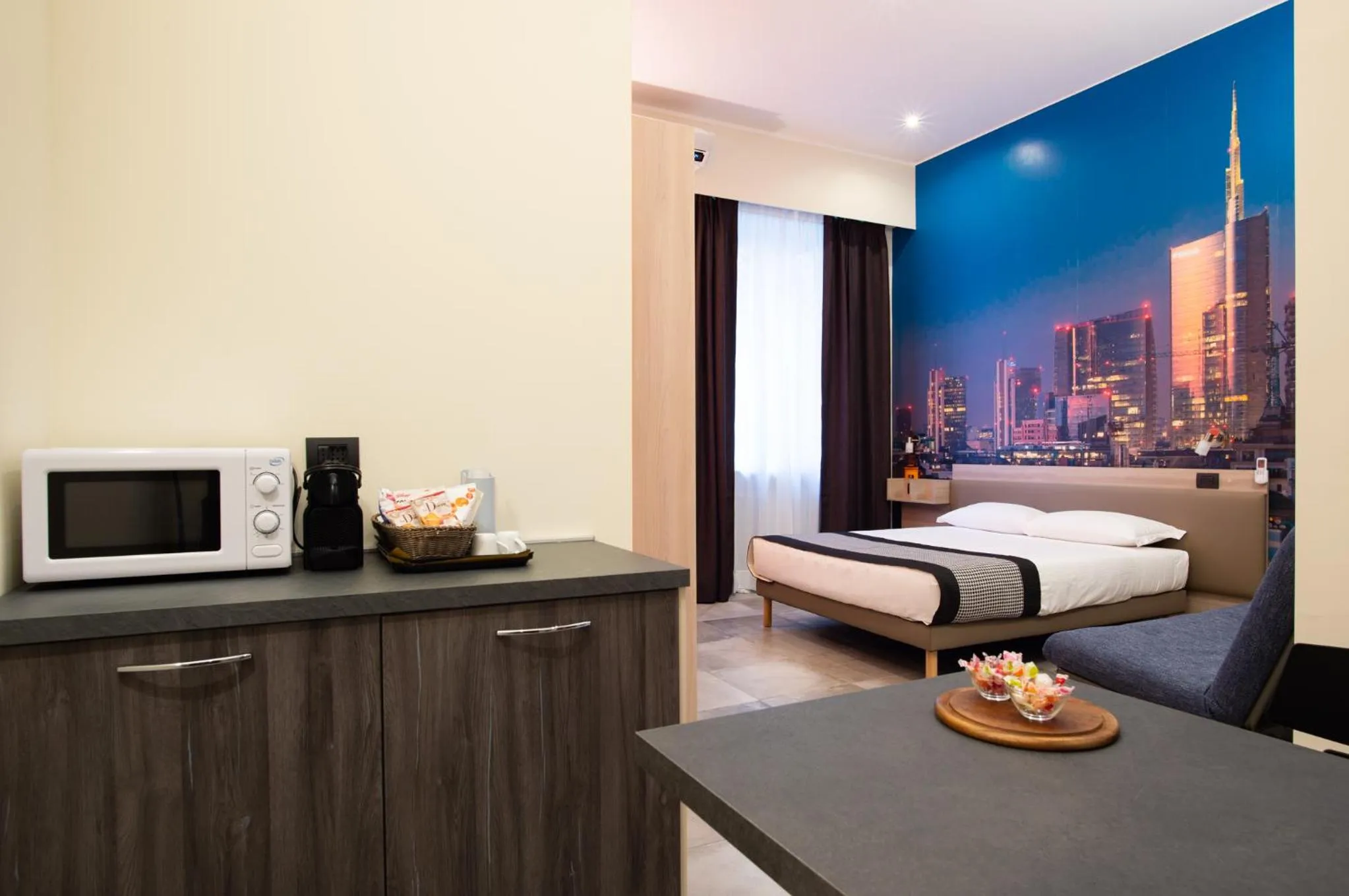 Living room, Bed in Aparthotel Porta Nuova