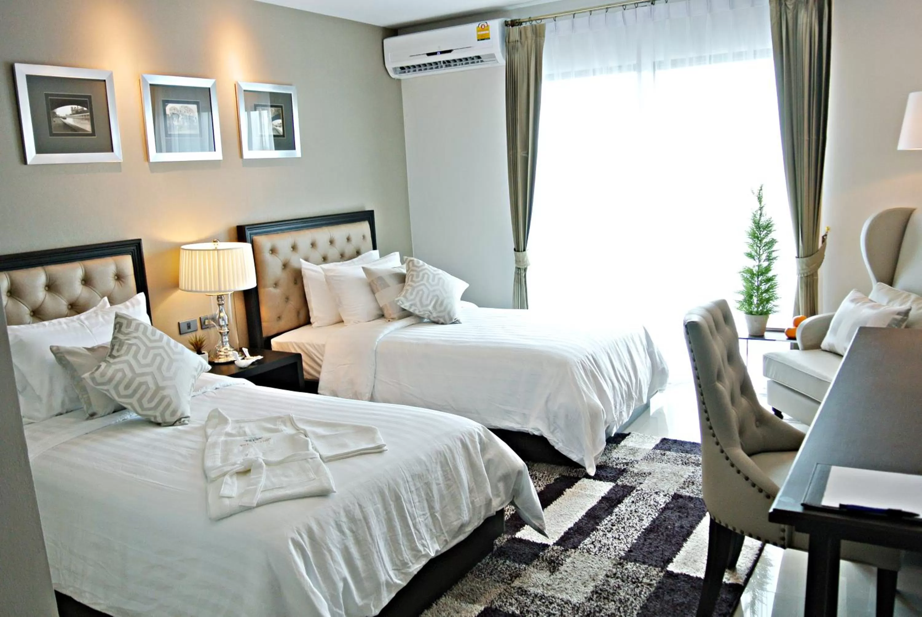 Photo of the whole room in SN Plus Hotel - SHA Plus