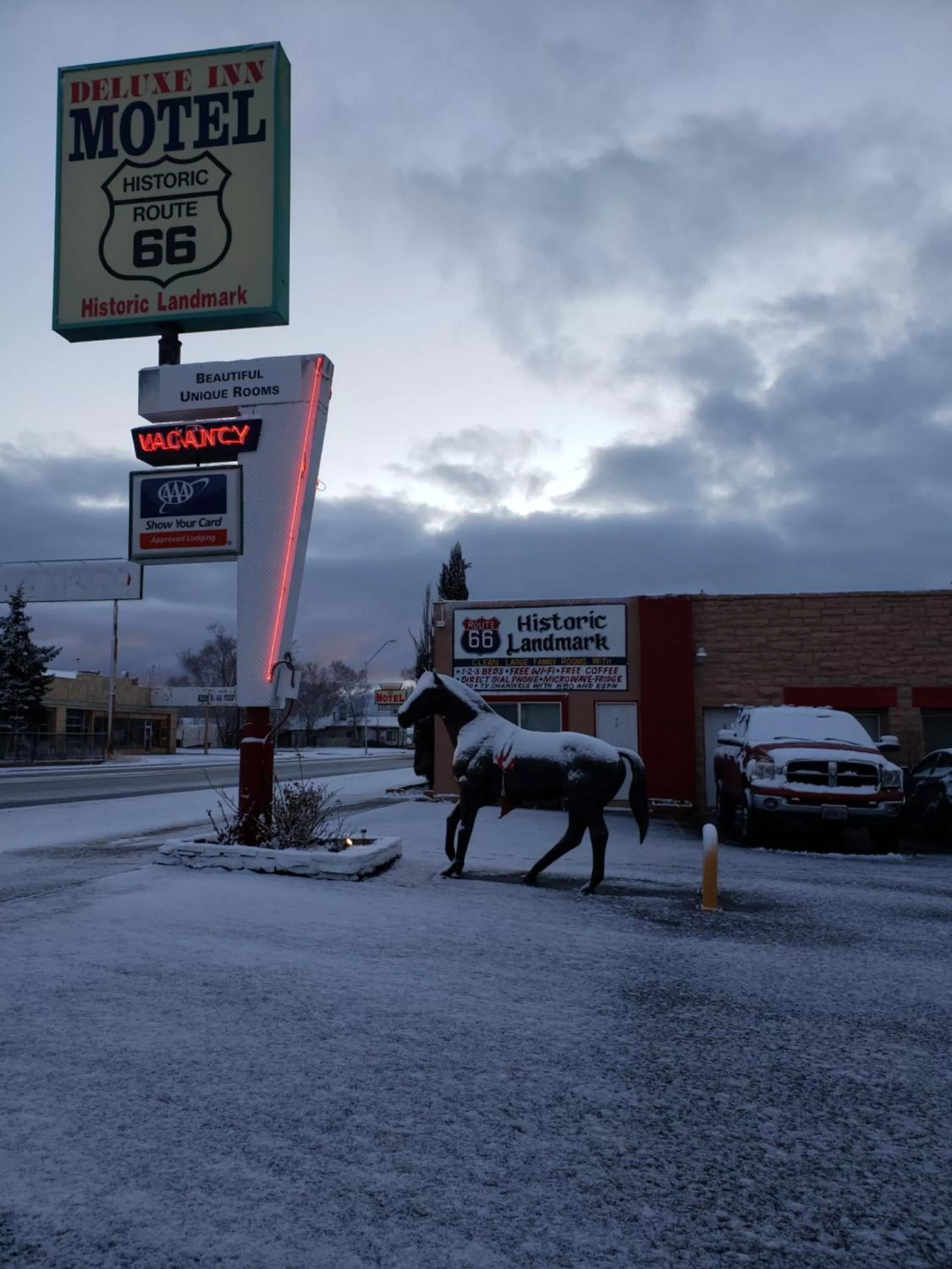 Property logo or sign in Deluxe Inn
