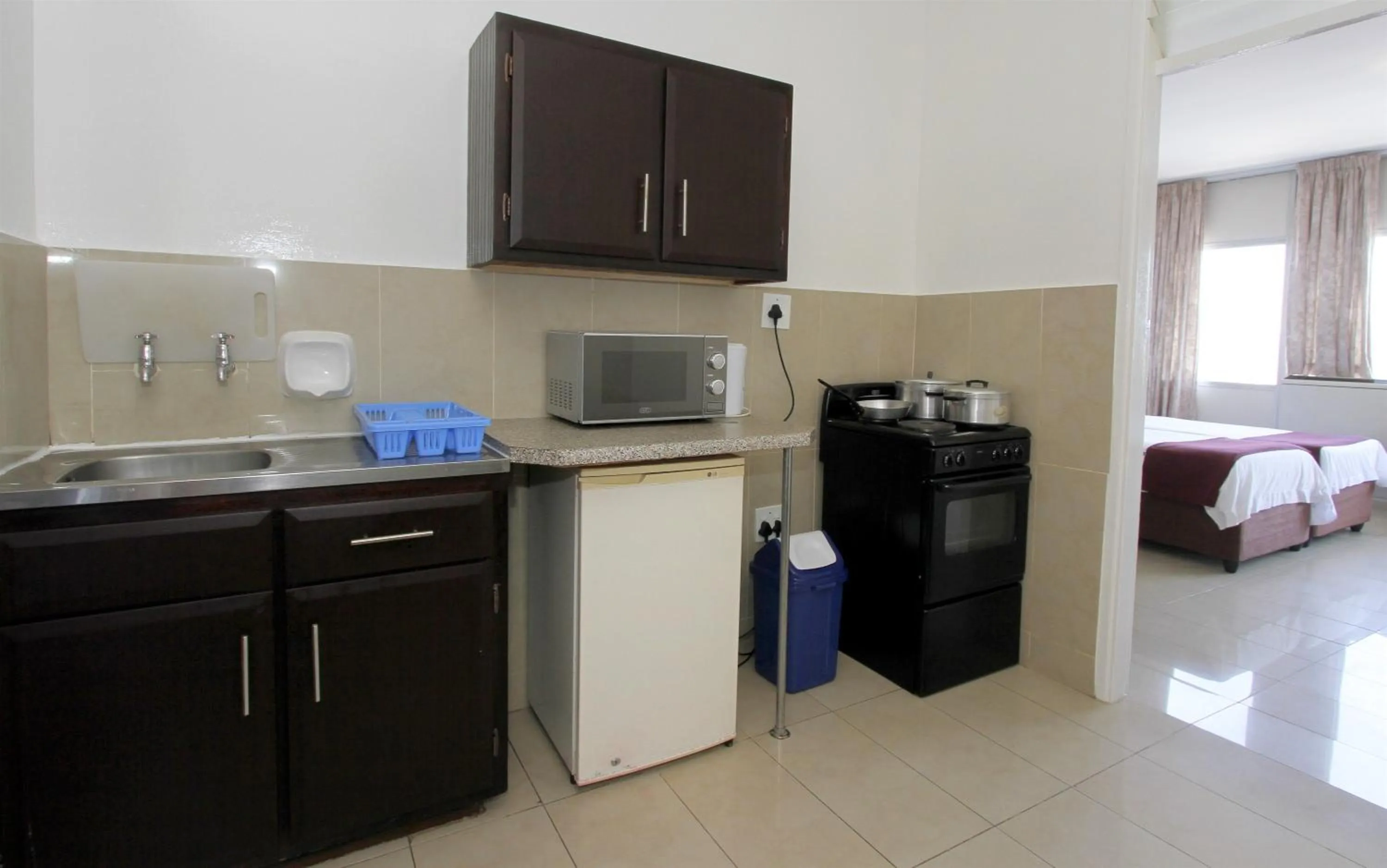 Kitchen or kitchenette in Coastlands Durban Self Catering Holiday Apartments
