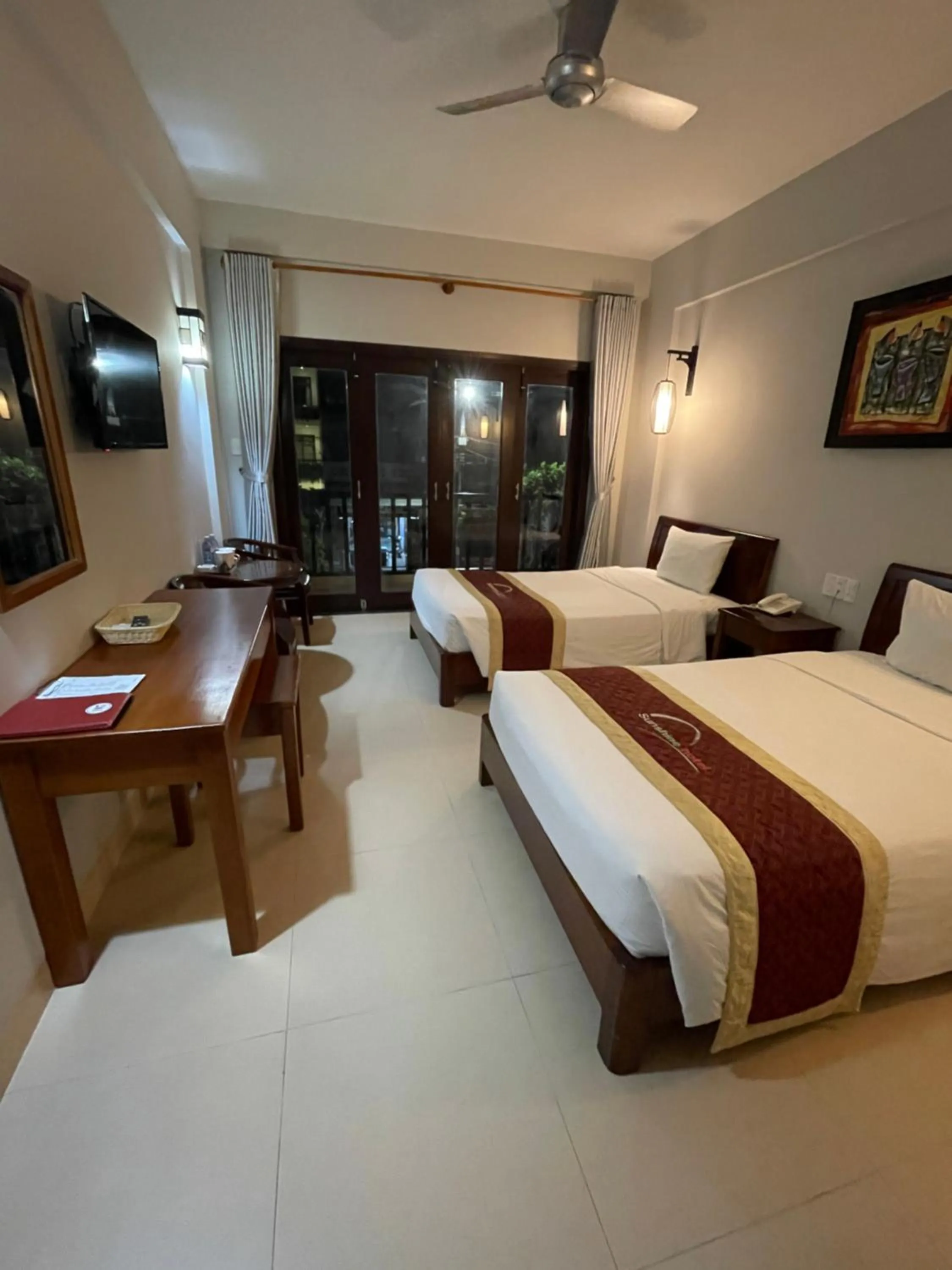 Bed in Sunshine Hoian Hotel