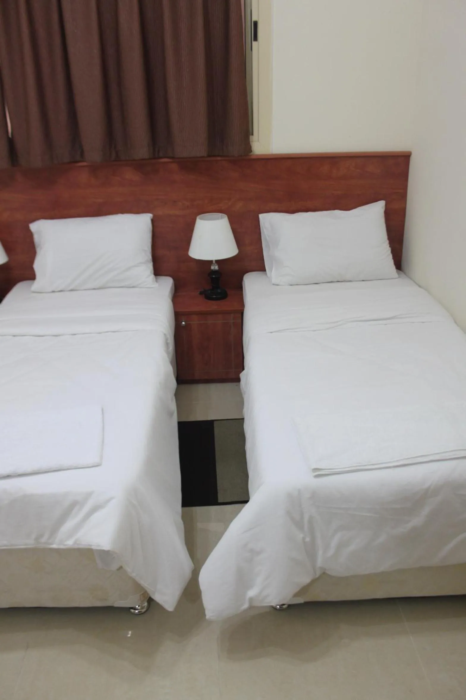 Bed in Africana Hotel