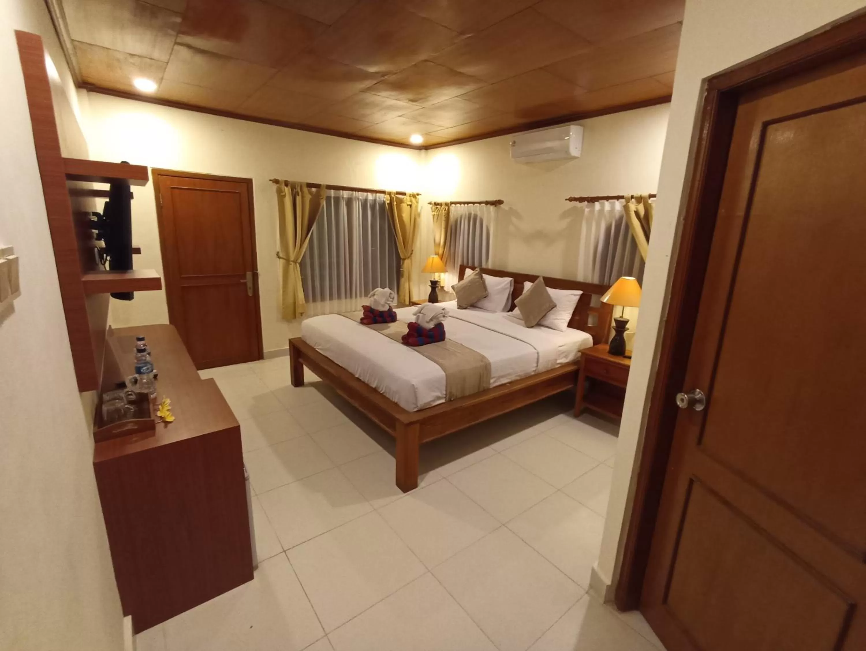 Bed in Kusnadi Hotel