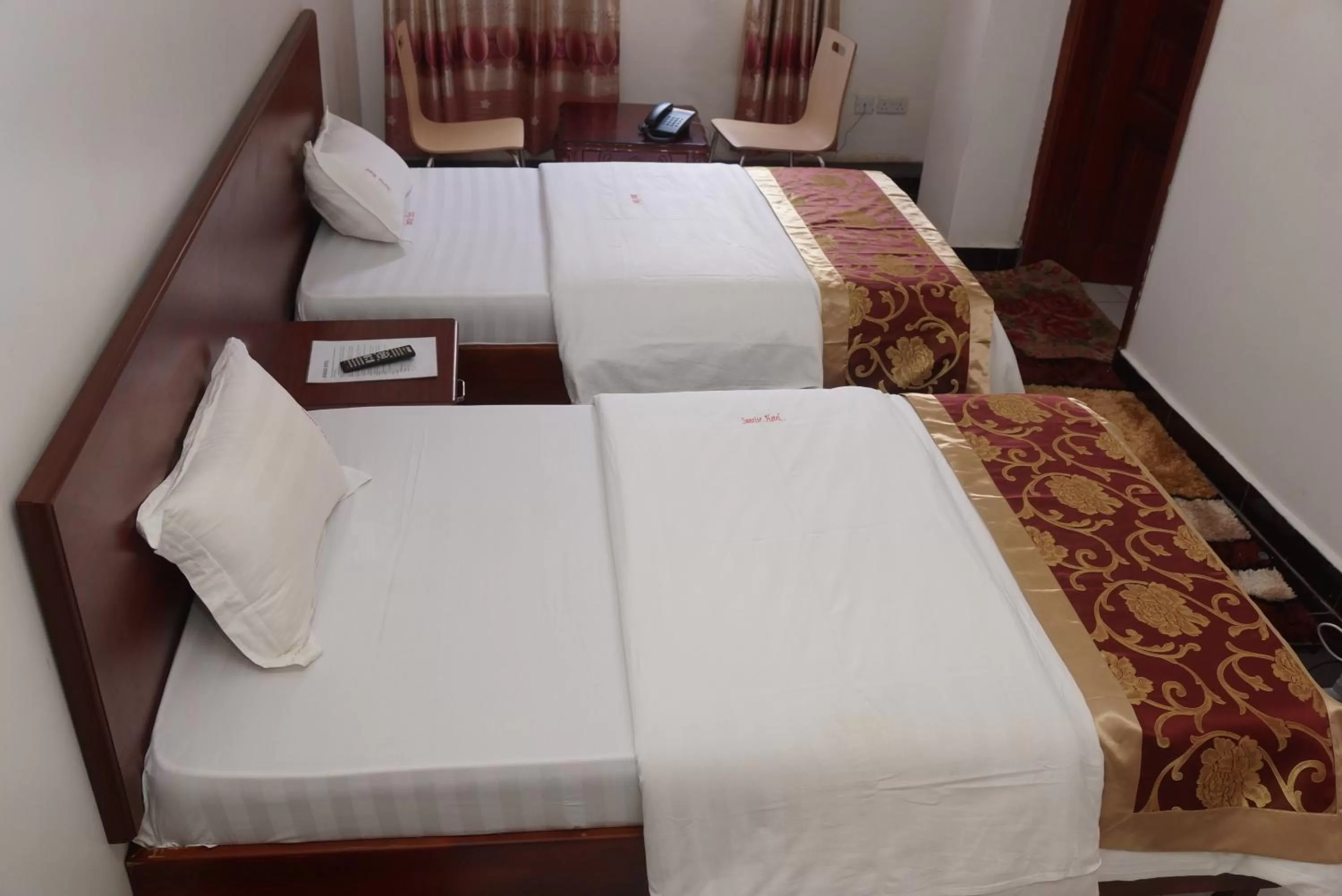 Bed in Sunrise Hotel Kampala