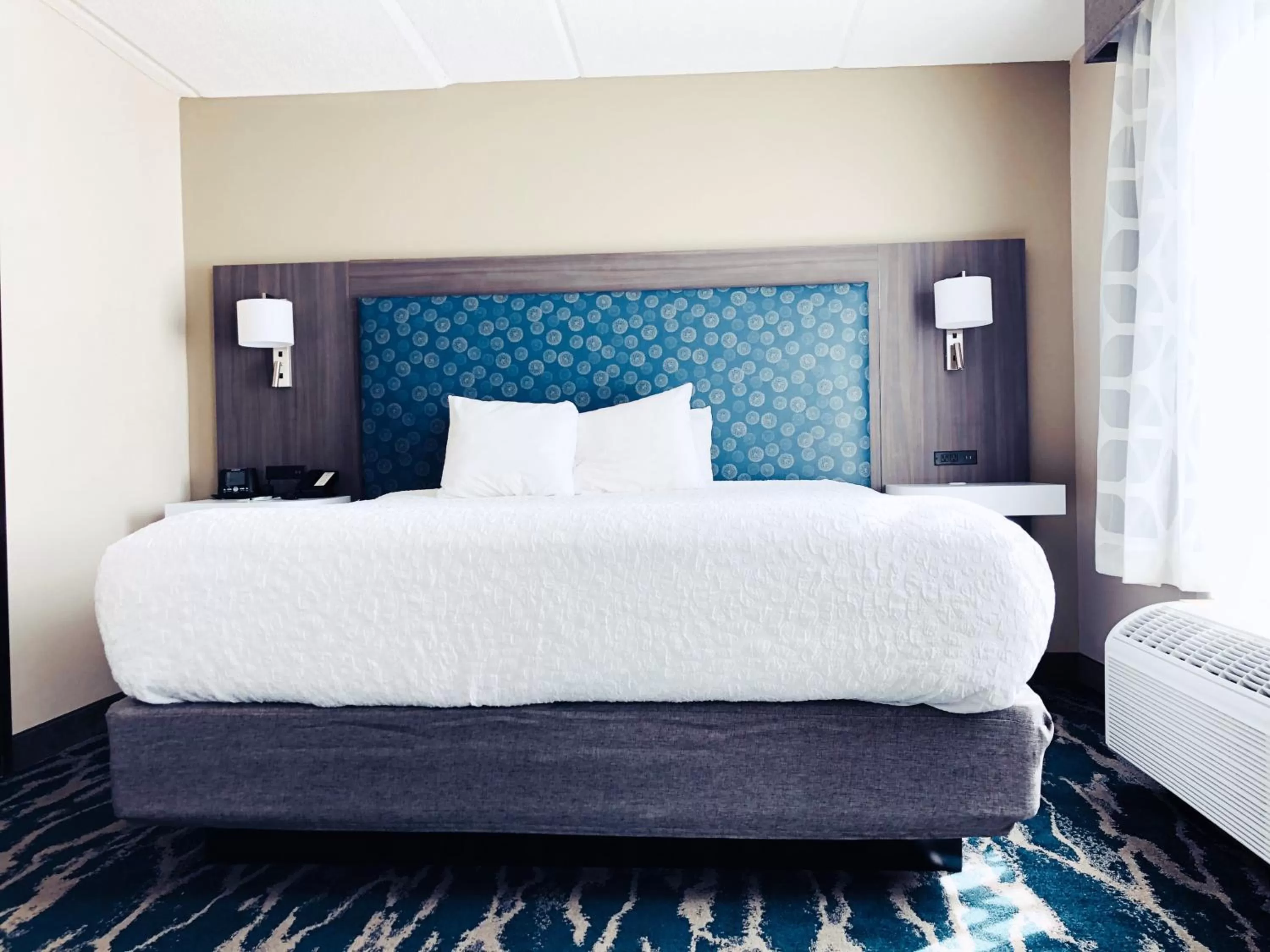 Bed in Comfort Inn & Suites Greenville Near East Carolina University