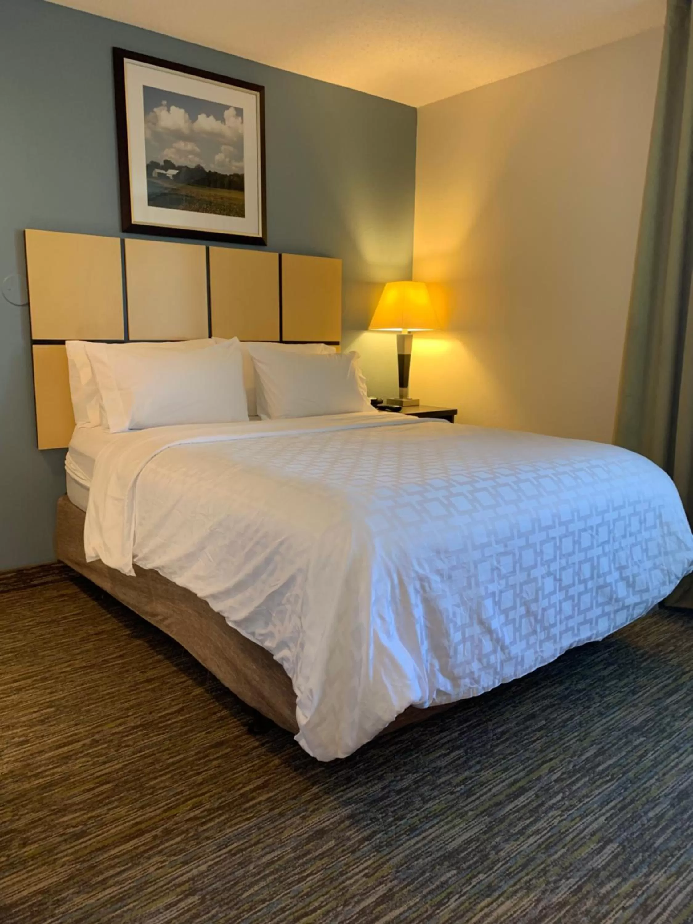 Bed in Candlewood Suites Fargo-North Dakota State University by IHG