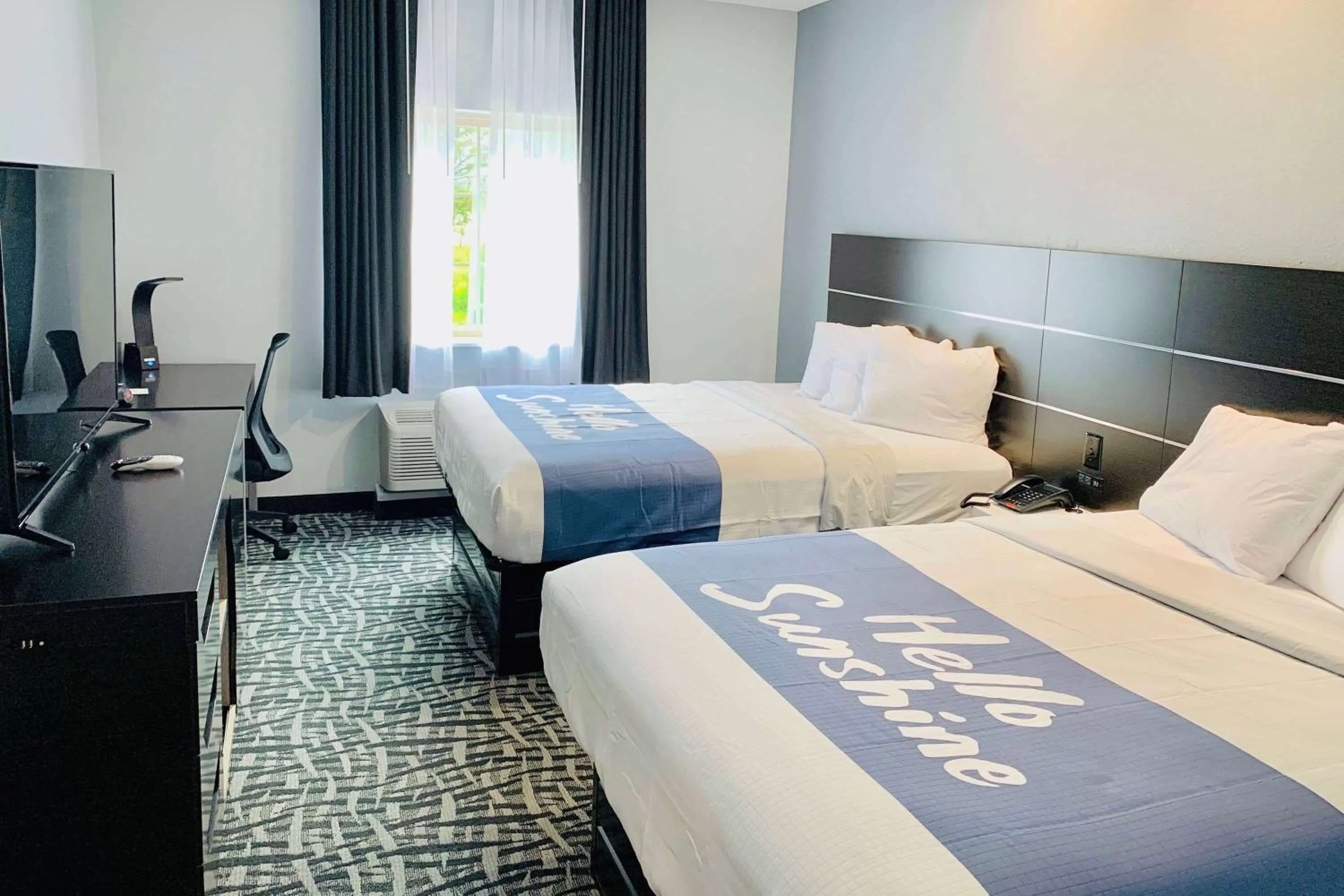 Photo of the whole room, Bed in Days Inn & Suites by Wyndham Horn Lake - Memphis Graceland