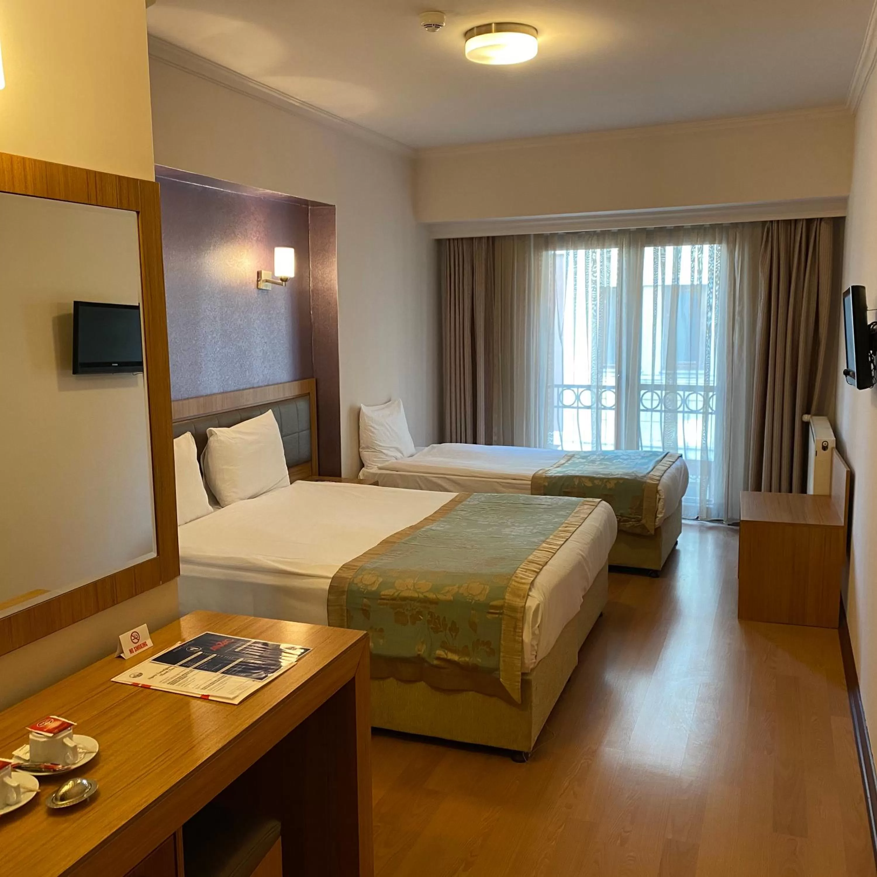 Bed in Grand Anzac Hotel