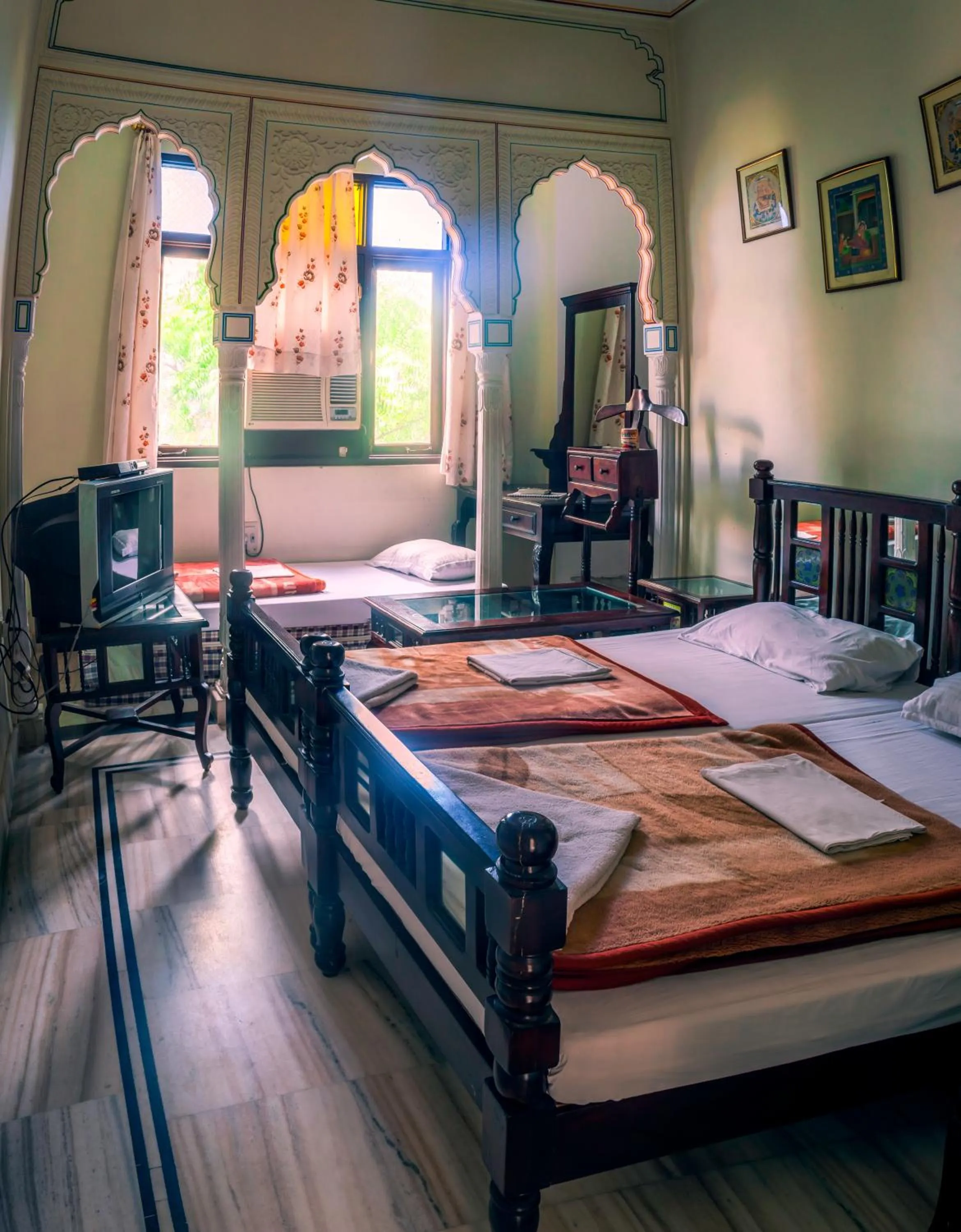 Bed in Krishna Palace - A Heritage Boutique Hotel