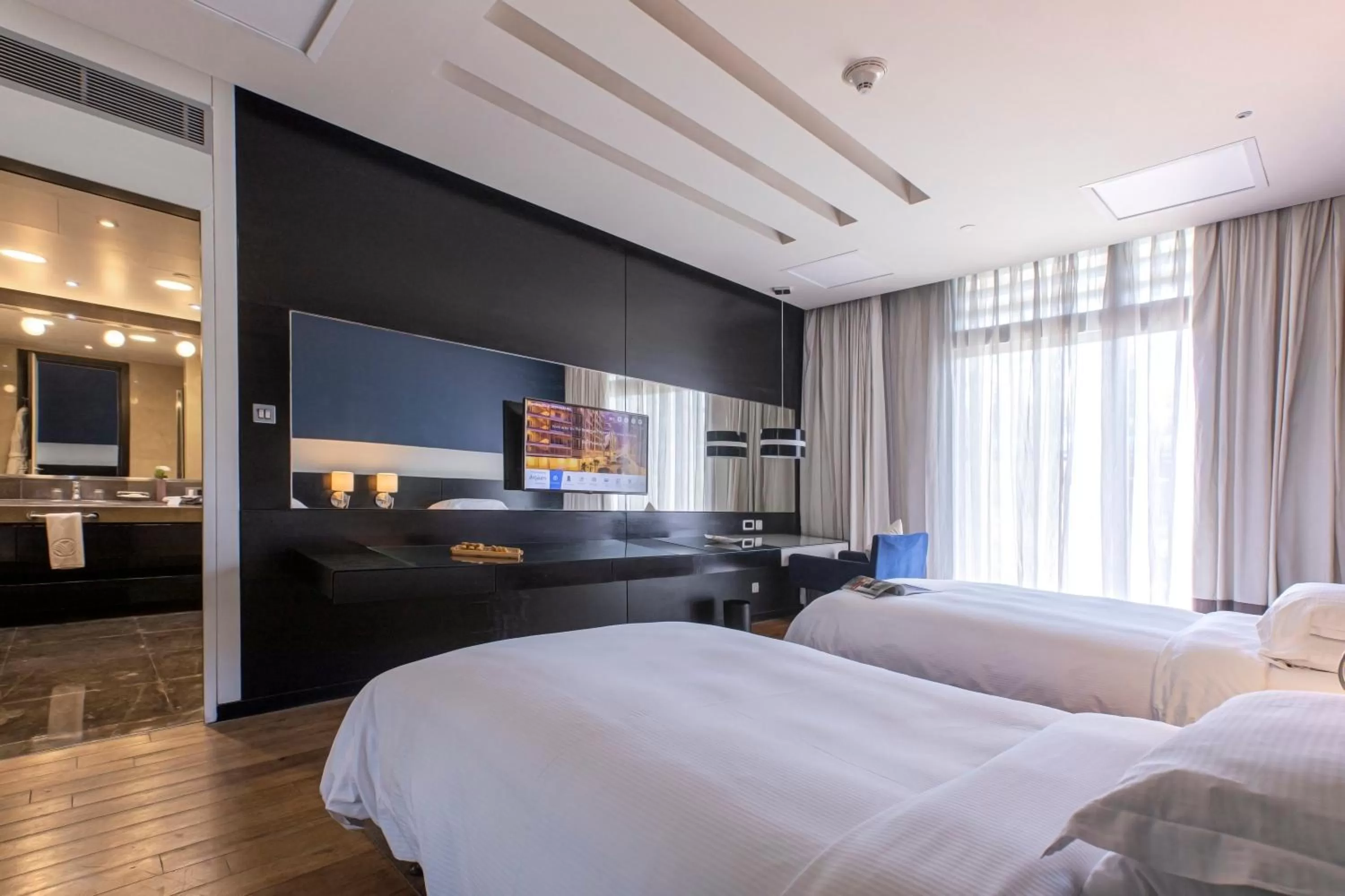 Bedroom, Bed in The Abdali Boulevard Hotel
