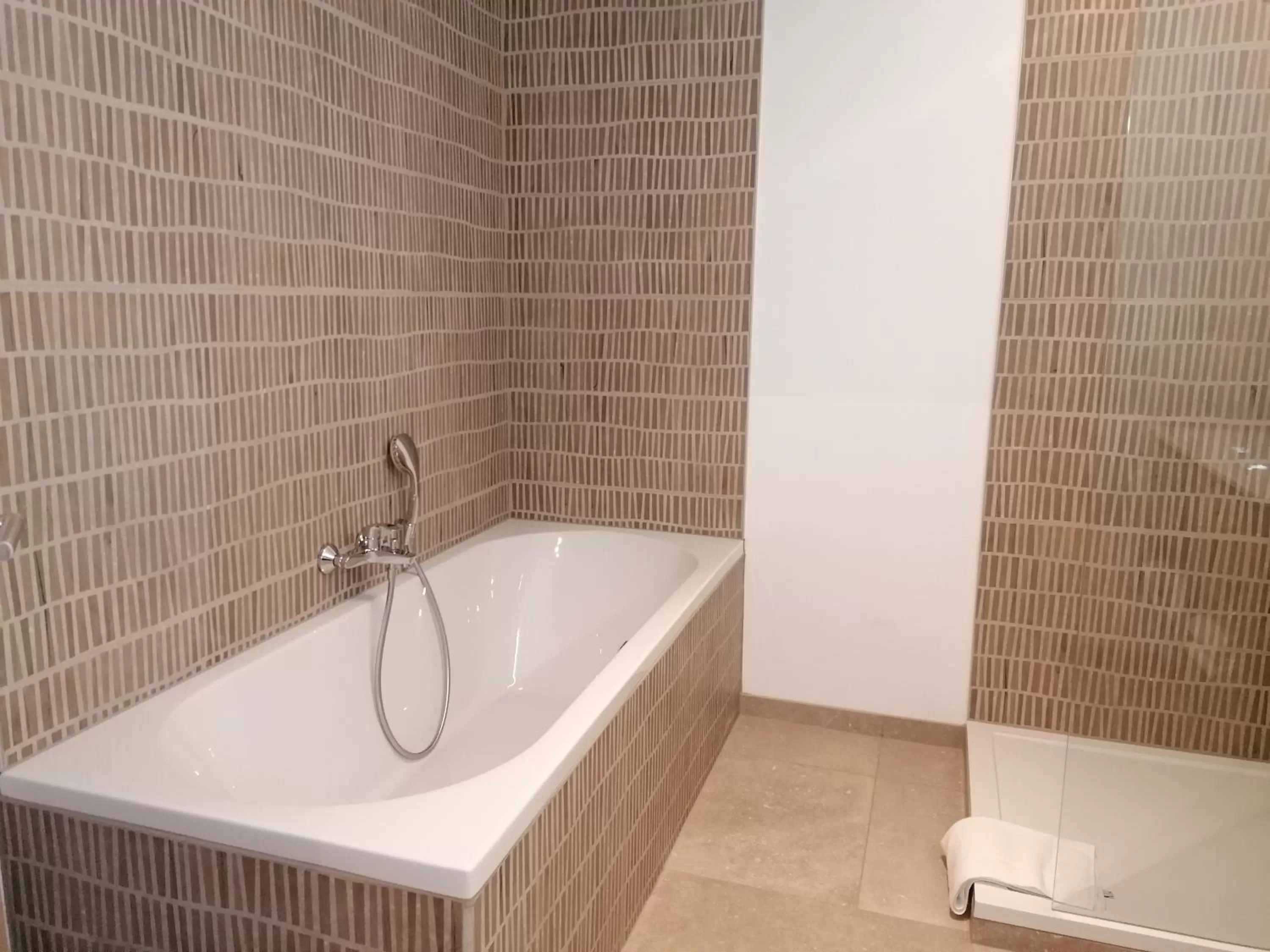 Bathroom in Appart hôtel En Ville