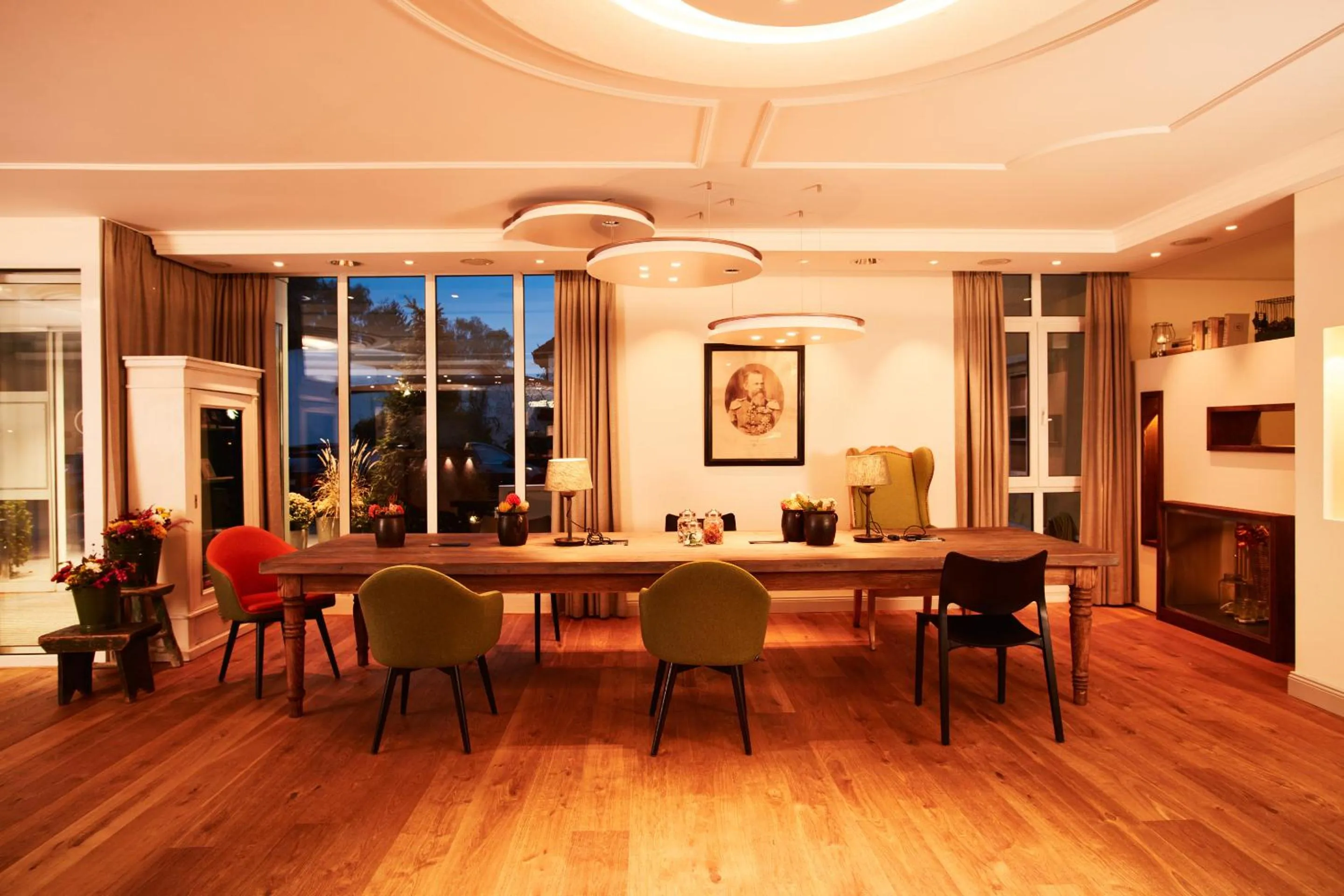 Communal lounge/ TV room in Hotel Prinzregent München Messe