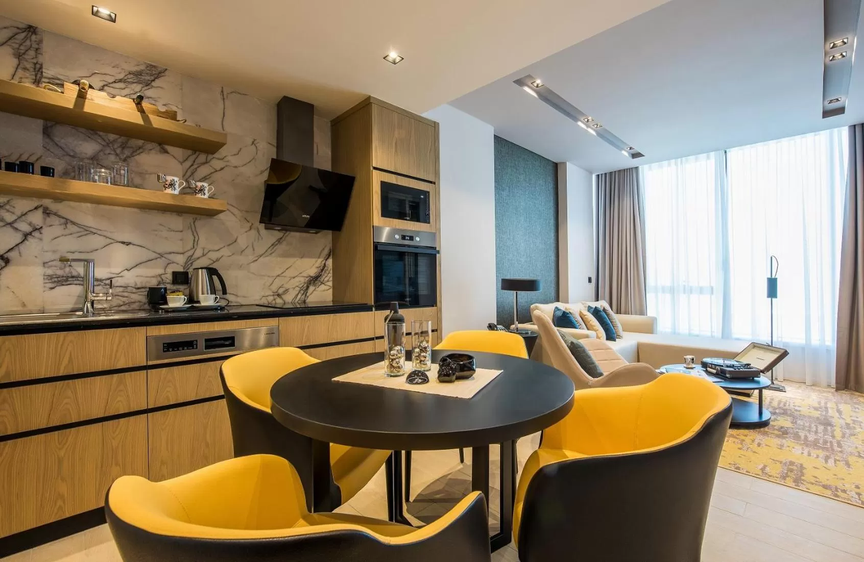 Dining area in WestSide Residences by Rotana