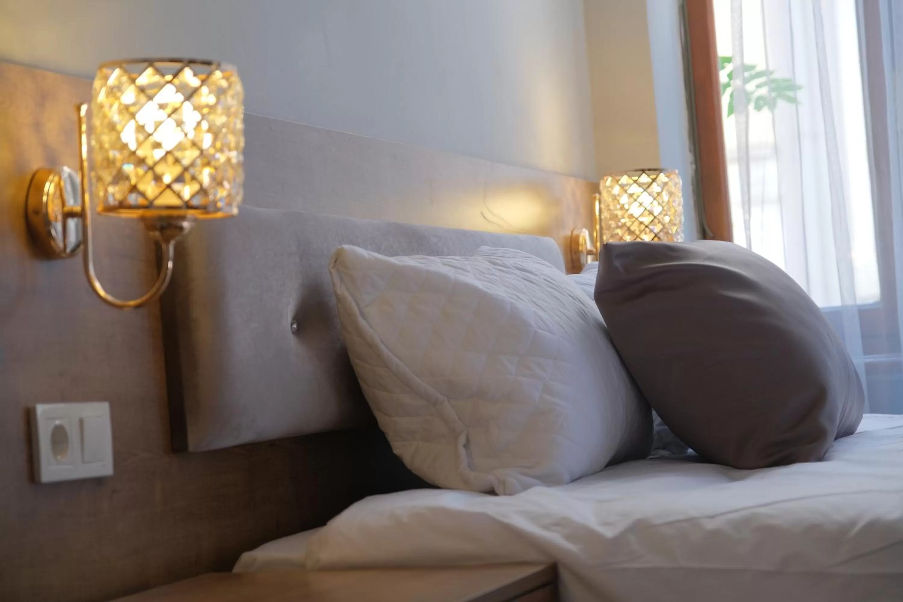 Bed in Adamantides Hotel