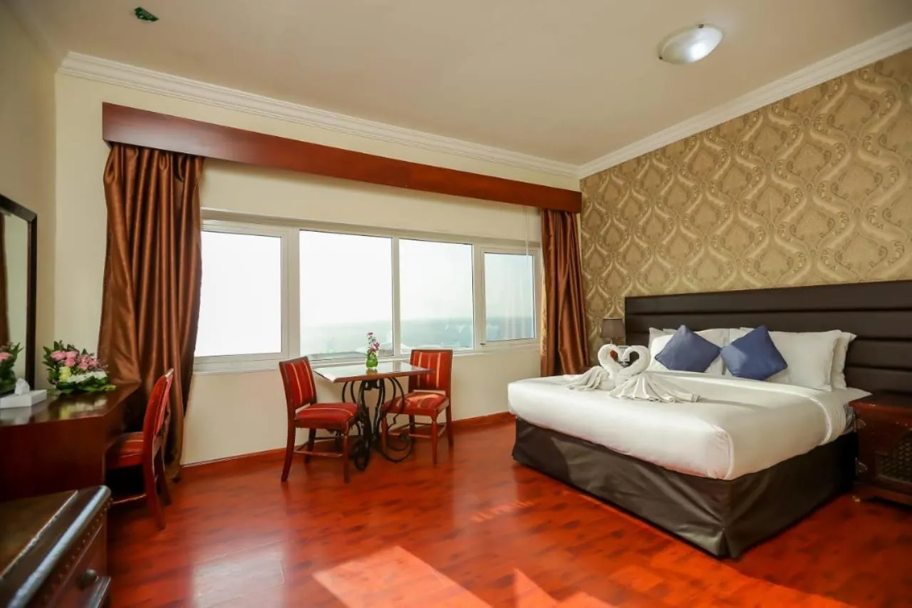 Bed in Mermaid Beach Hotel LLC