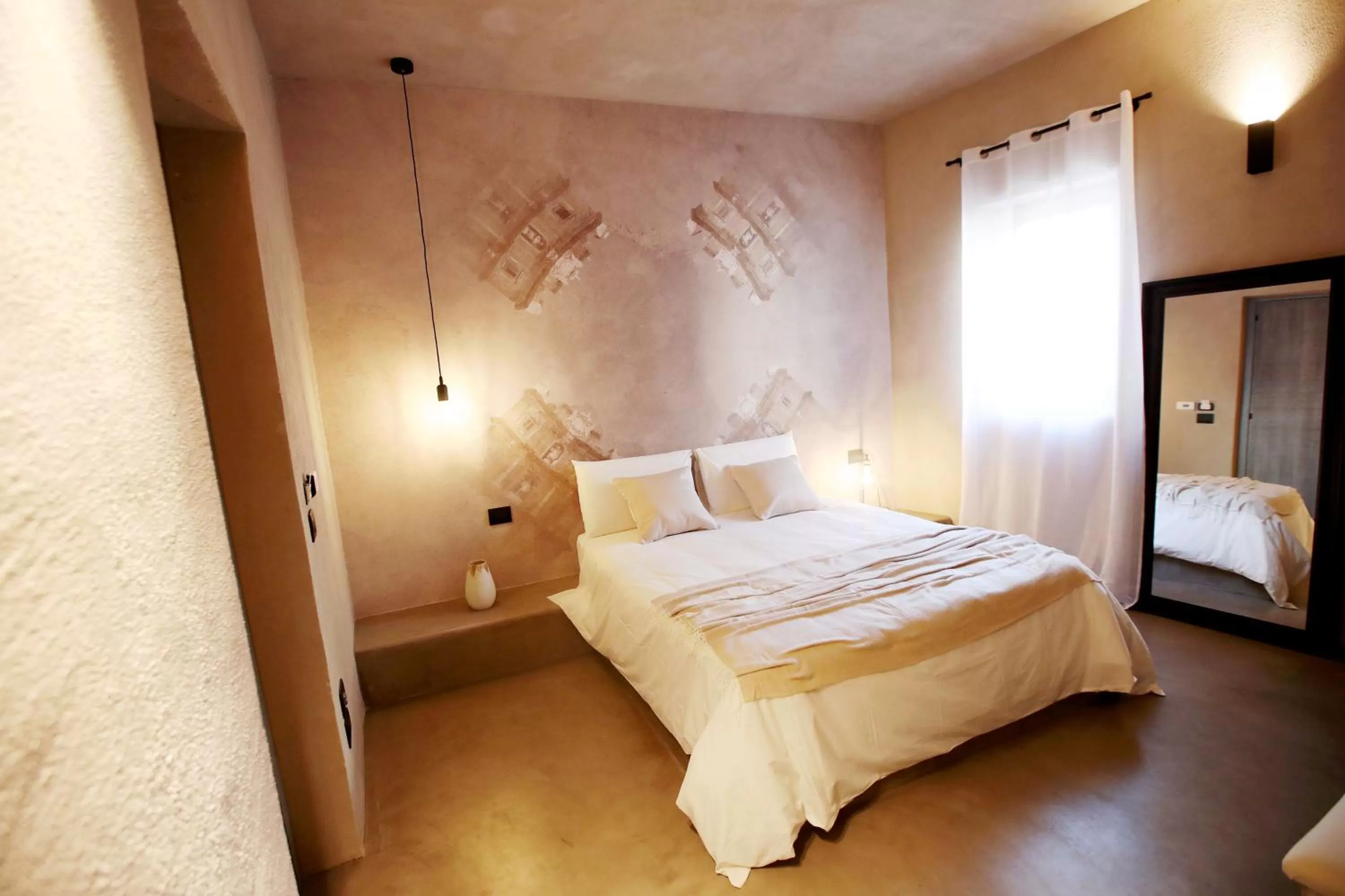 Bed in Casa Nostra Luxury Suites & Spa