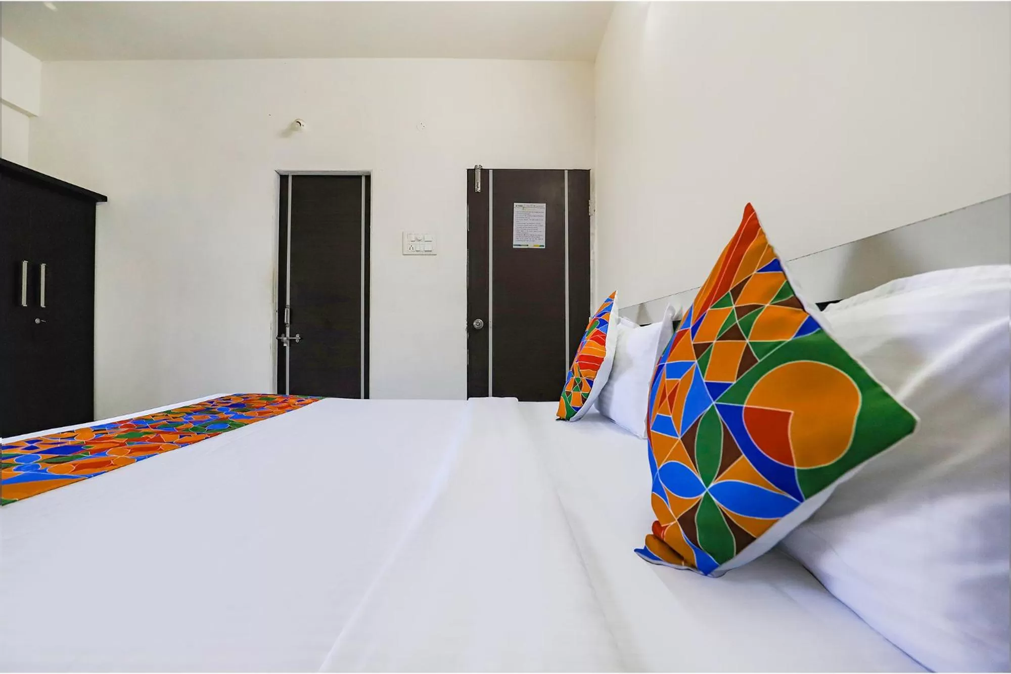 Bed in FabHotel Elite Palm