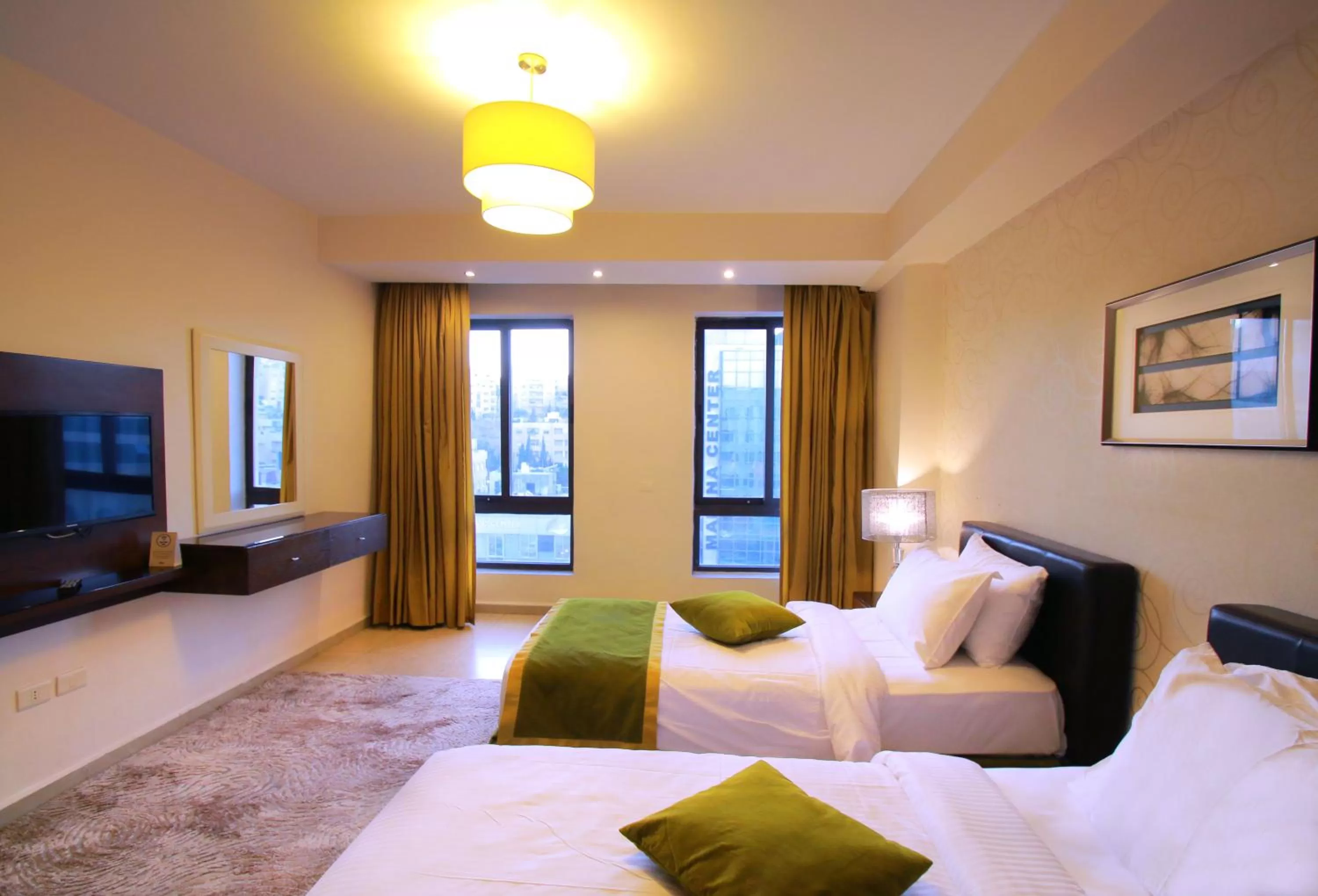 Bed in City Rose Hotel Suites