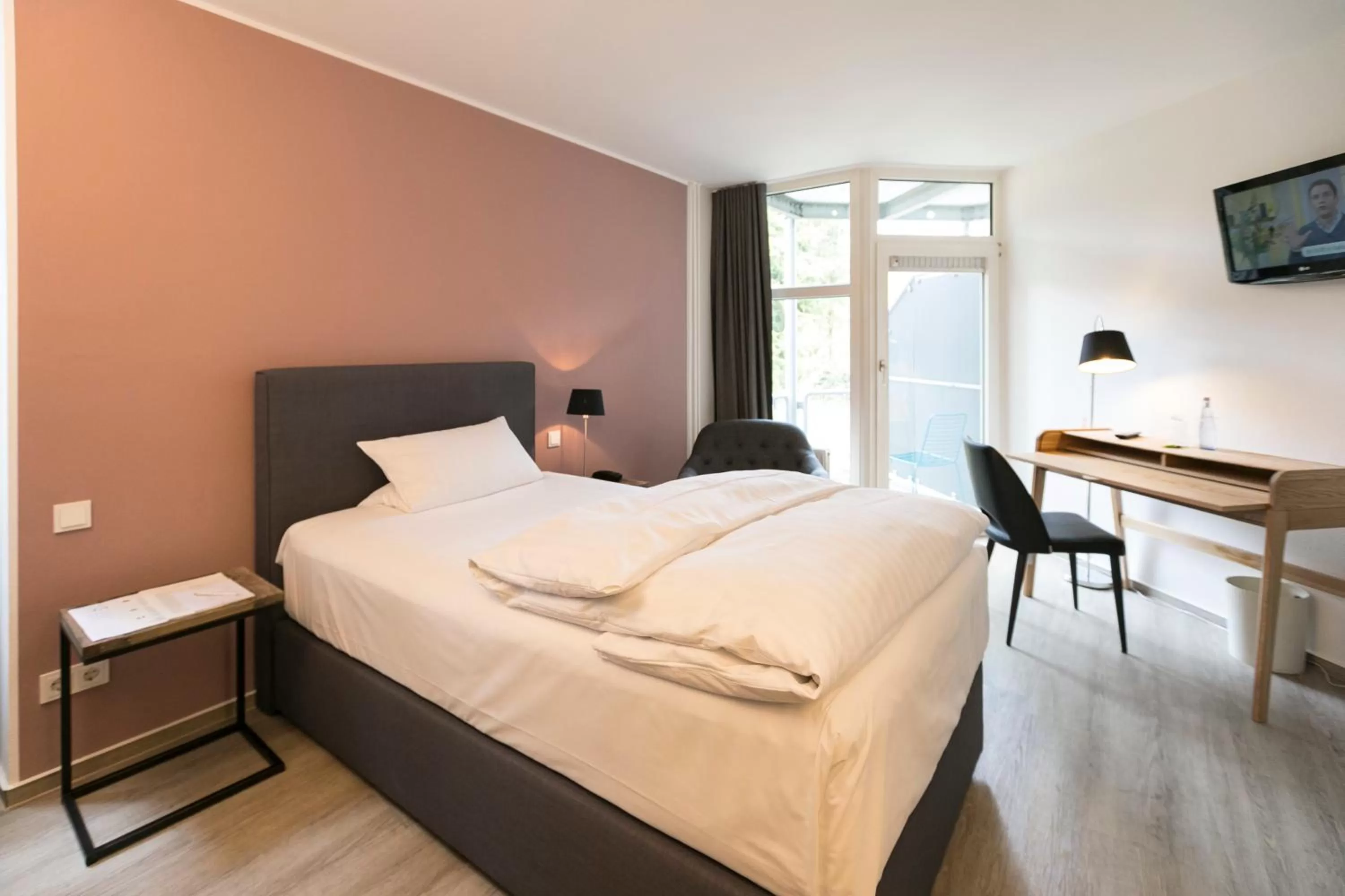 Photo of the whole room, Bed in Wald & Golfhotel Lottental