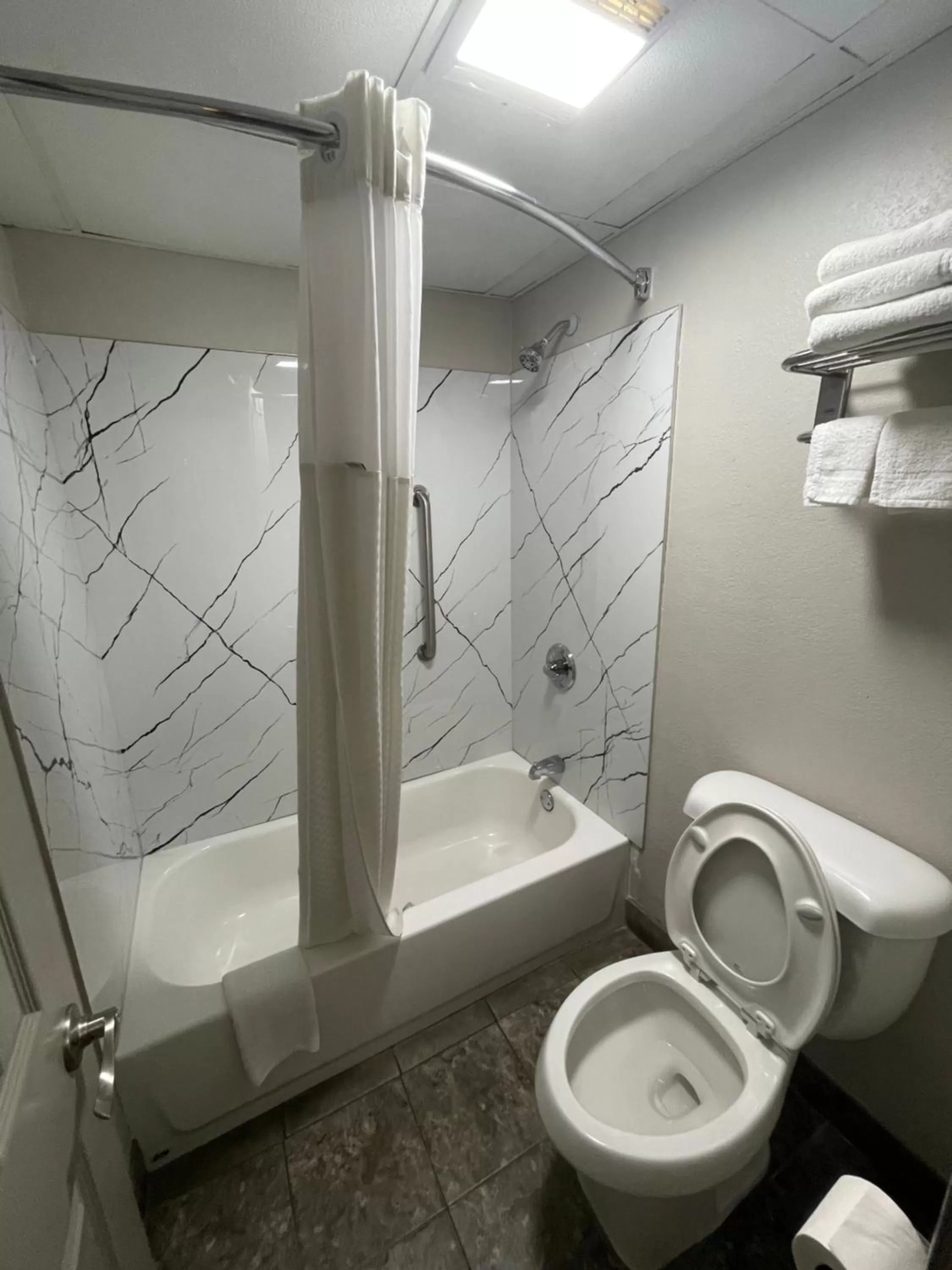 Toilet in Days Inn by Wyndham Holladay