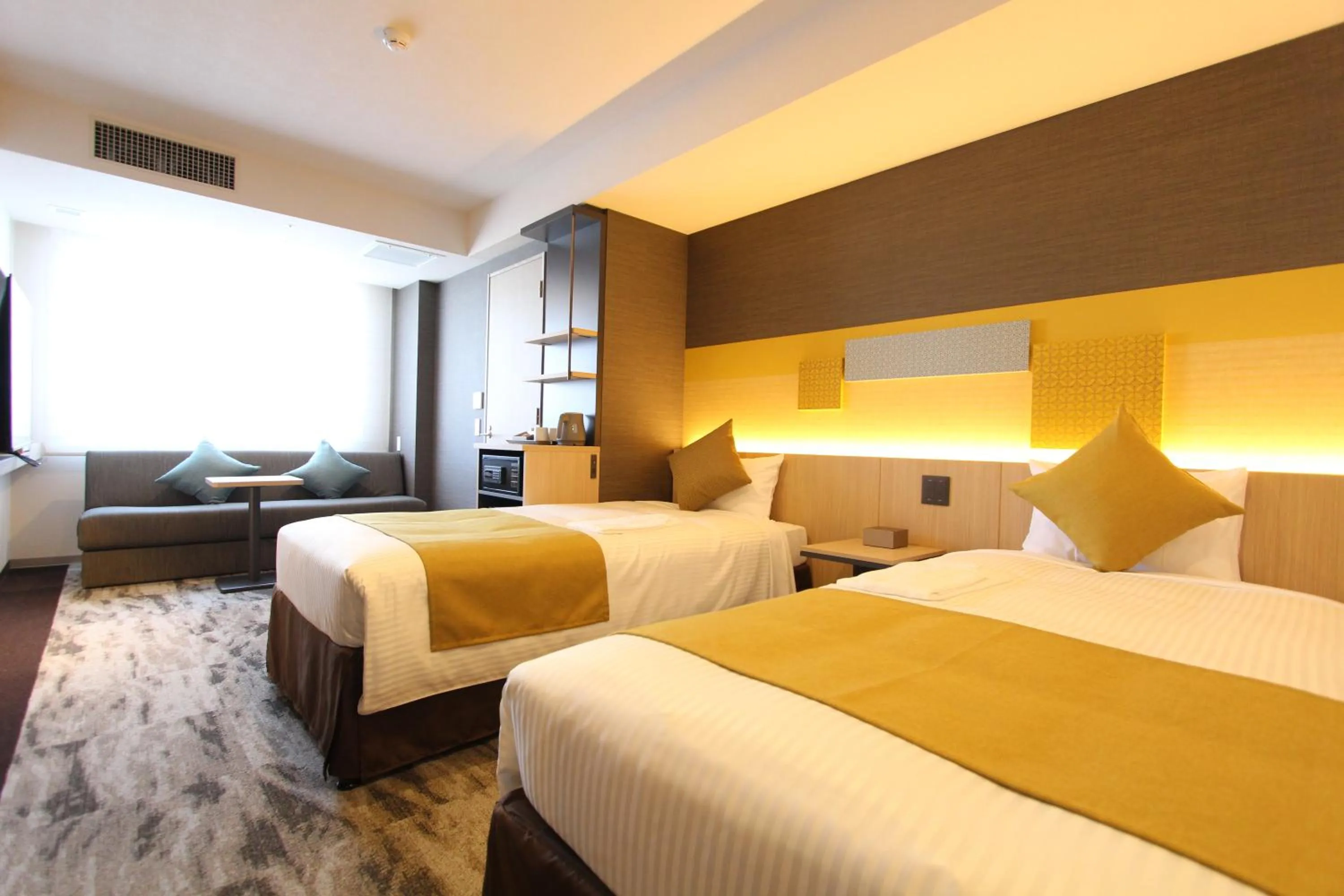 Bed in KOKO HOTEL Tsukiji Ginza