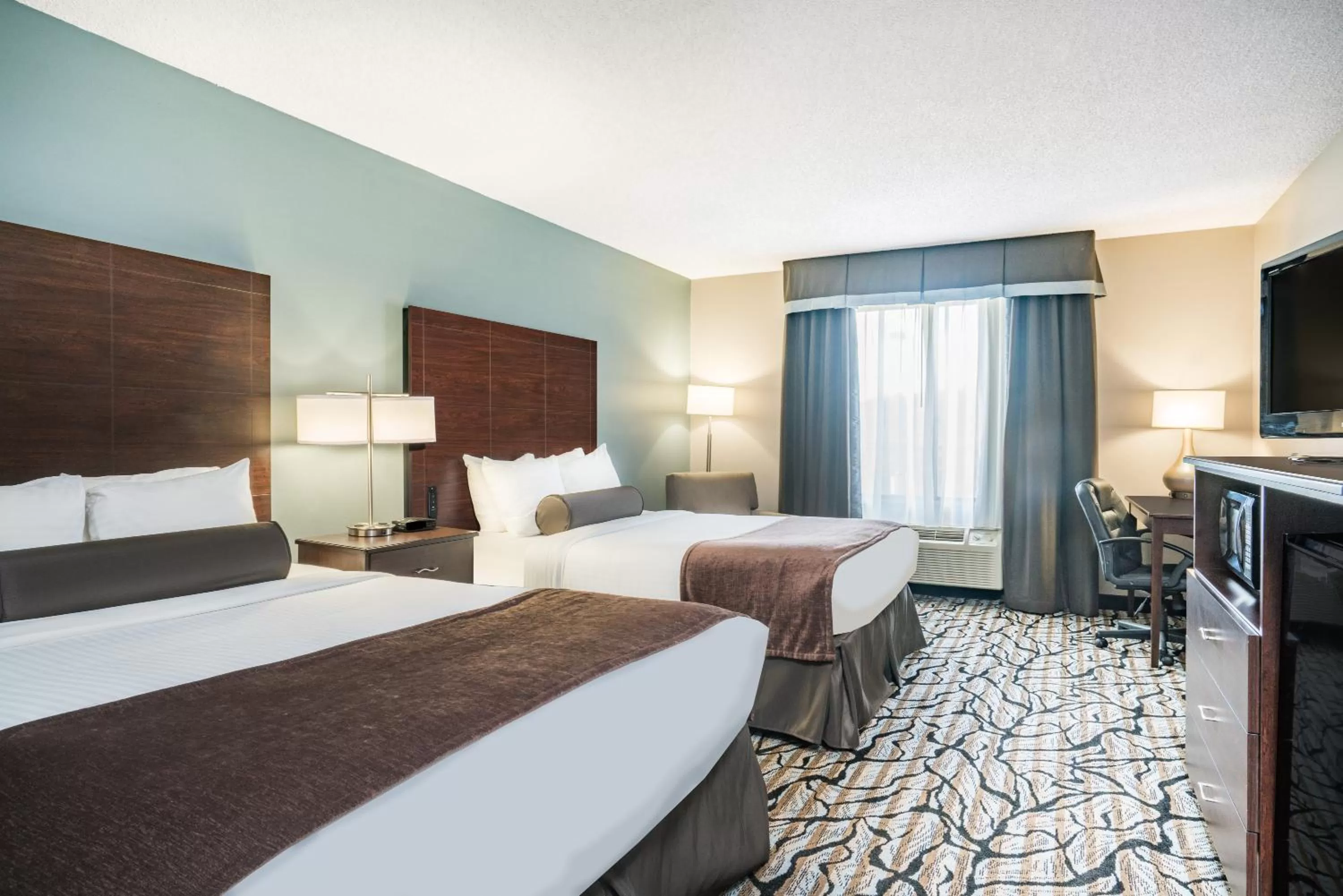 Queen Room with Two Queen Beds - Non-Smoking in Days Inn & Suites by Wyndham Wausau