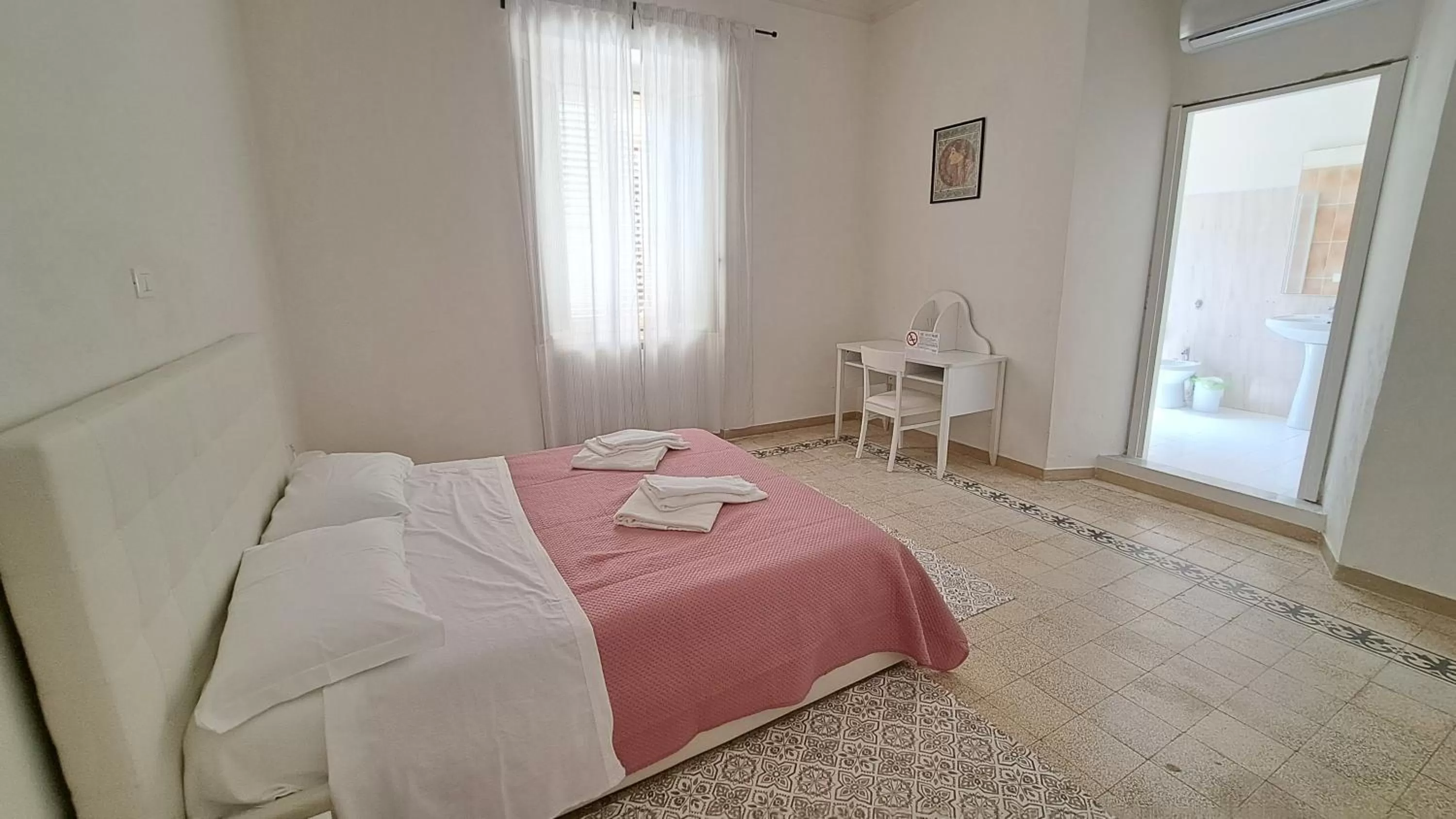 Bed in B & B le tre rose