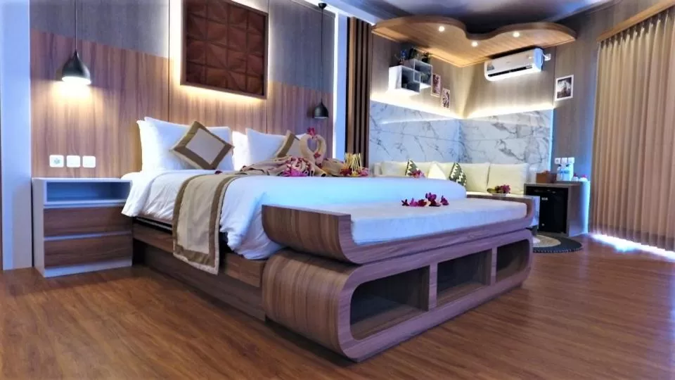 Bed in SUITE OCEAN BLUE