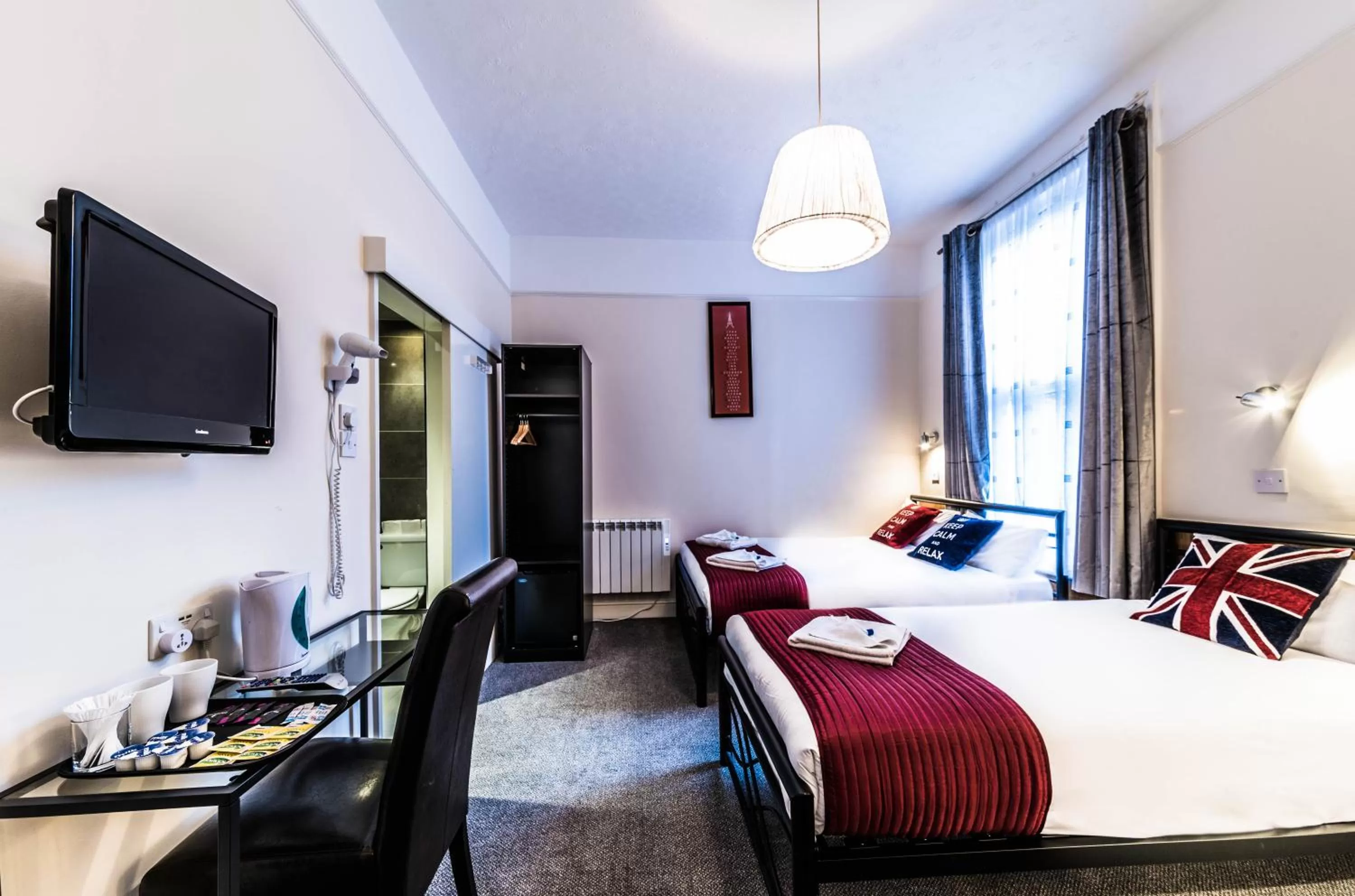 TV and multimedia, TV/Entertainment Center in Hellenic Hotel by Saba