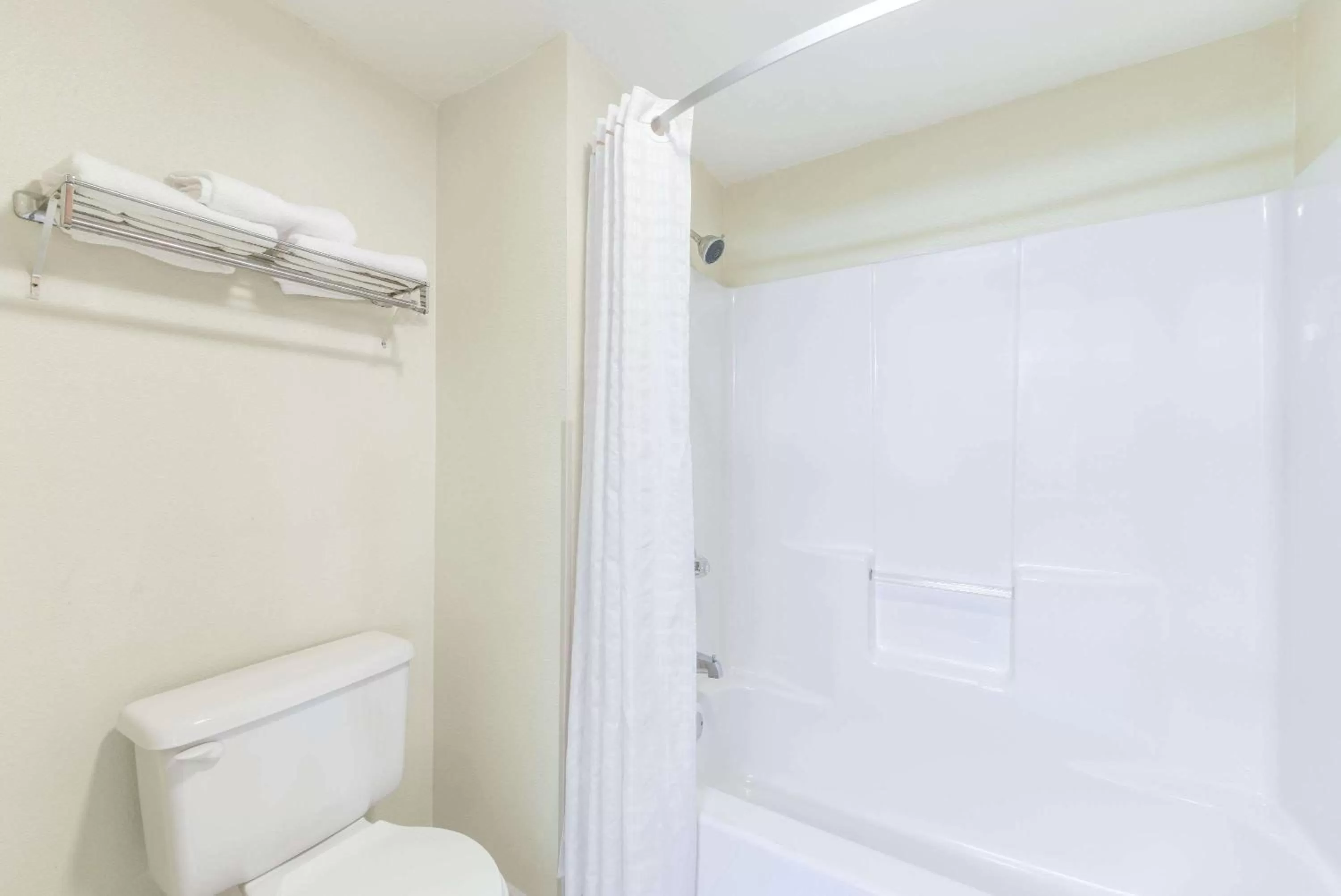 Bathroom in Super 8 by Wyndham Burleson Fort Worth Area