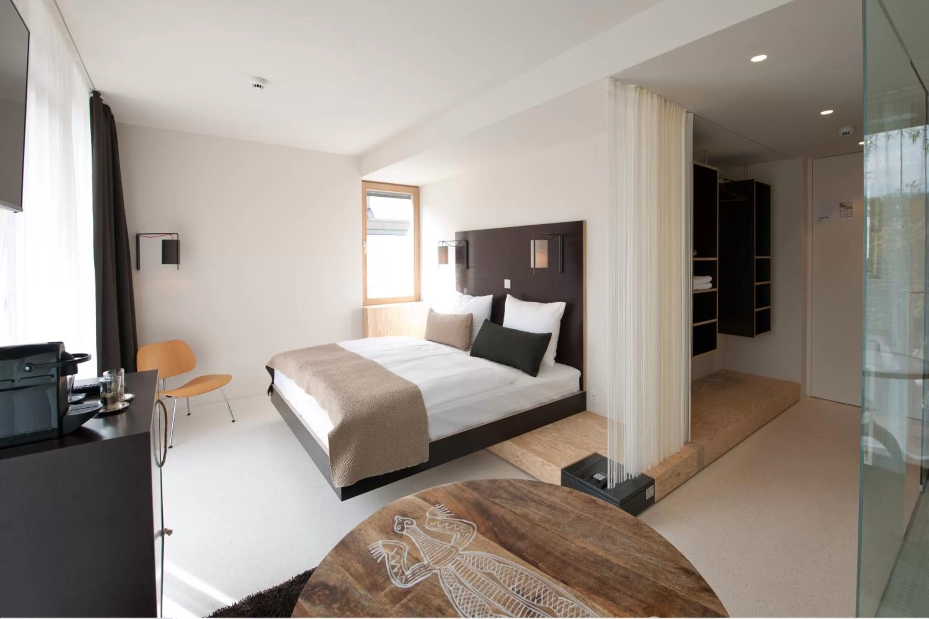 Seating area, Bed in Nala Individuellhotel