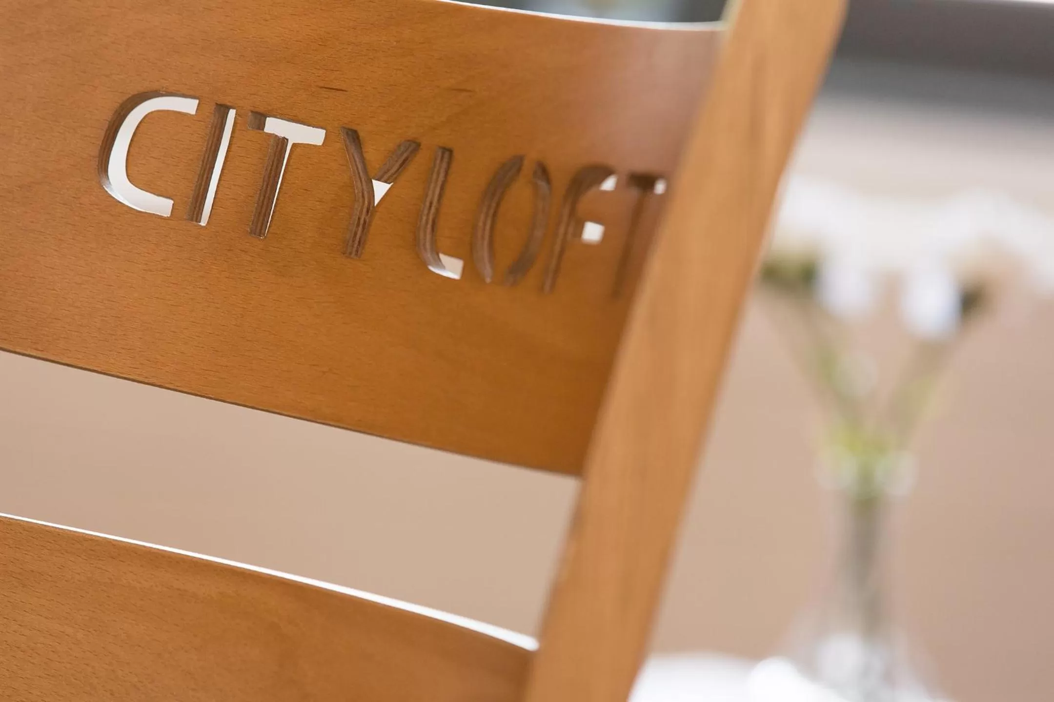 Property logo or sign in T3 Hotel Cityloft