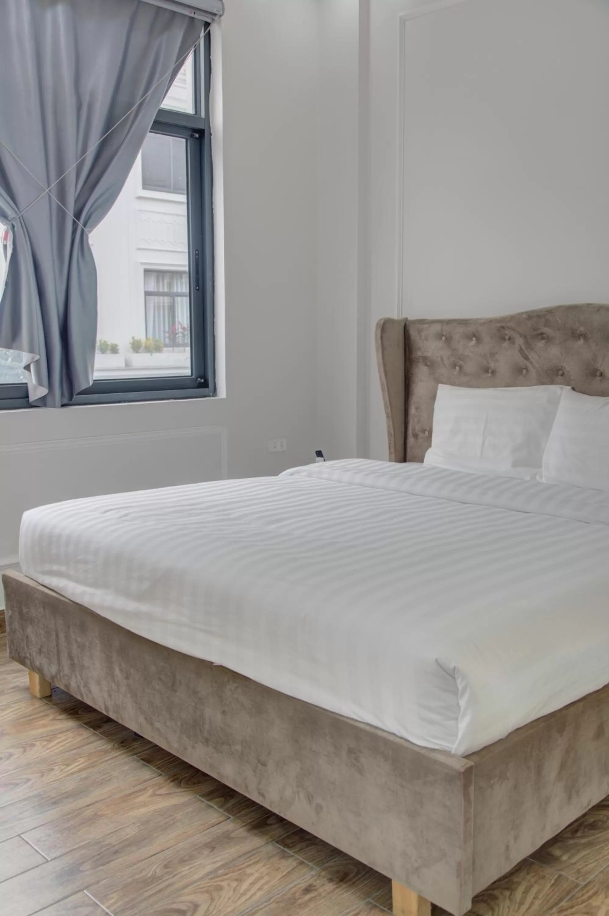 Photo of the whole room, Bed in The Flamboyant #StayWork Vinhomes Marina