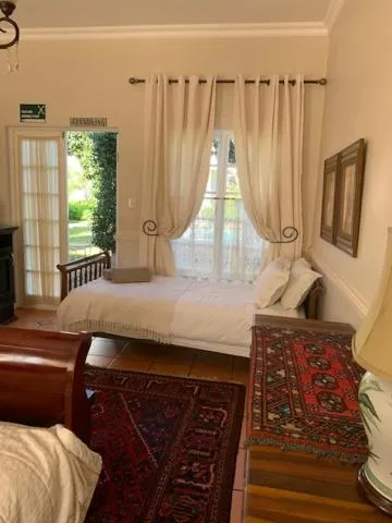 Photo of the whole room, Bed in A Tapestry Garden Guest House