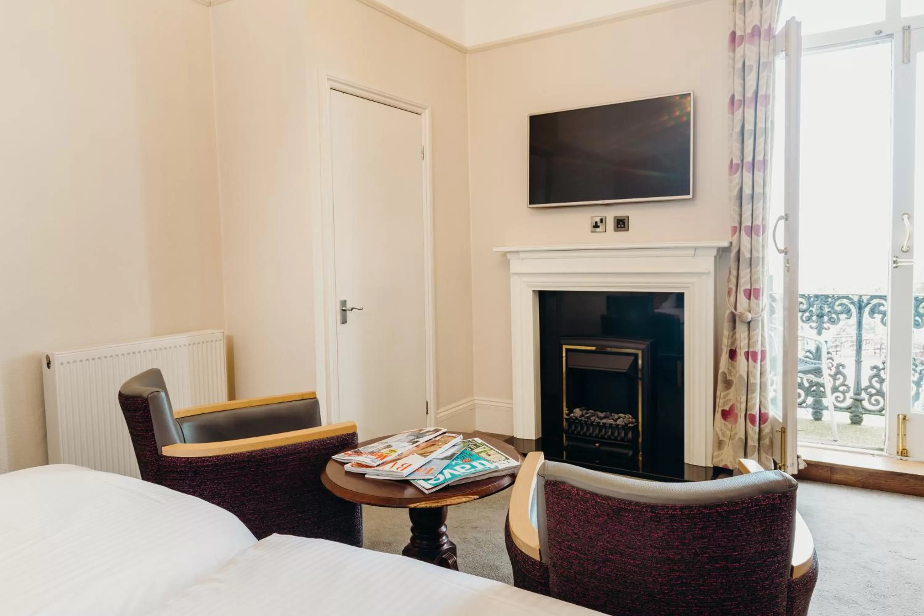 Living room, Bed in Crown Spa Hotel Scarborough by Compass Hospitality