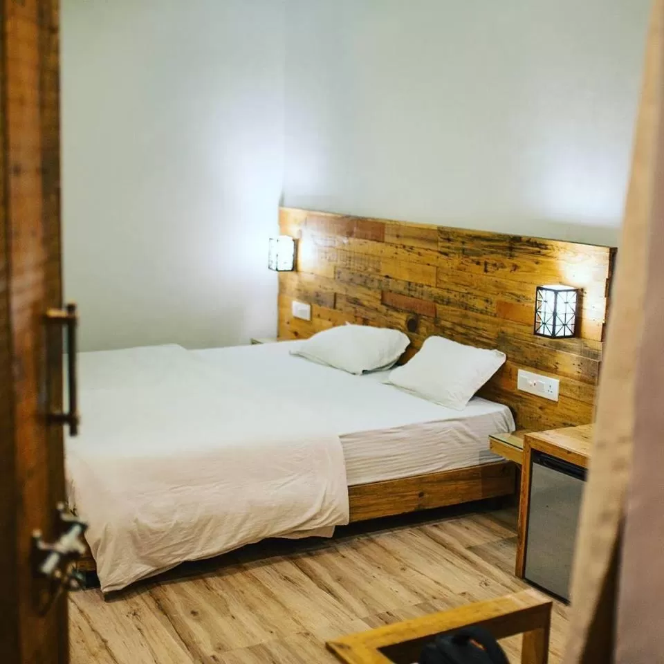 Bed in Hill Top Swiss Cottage