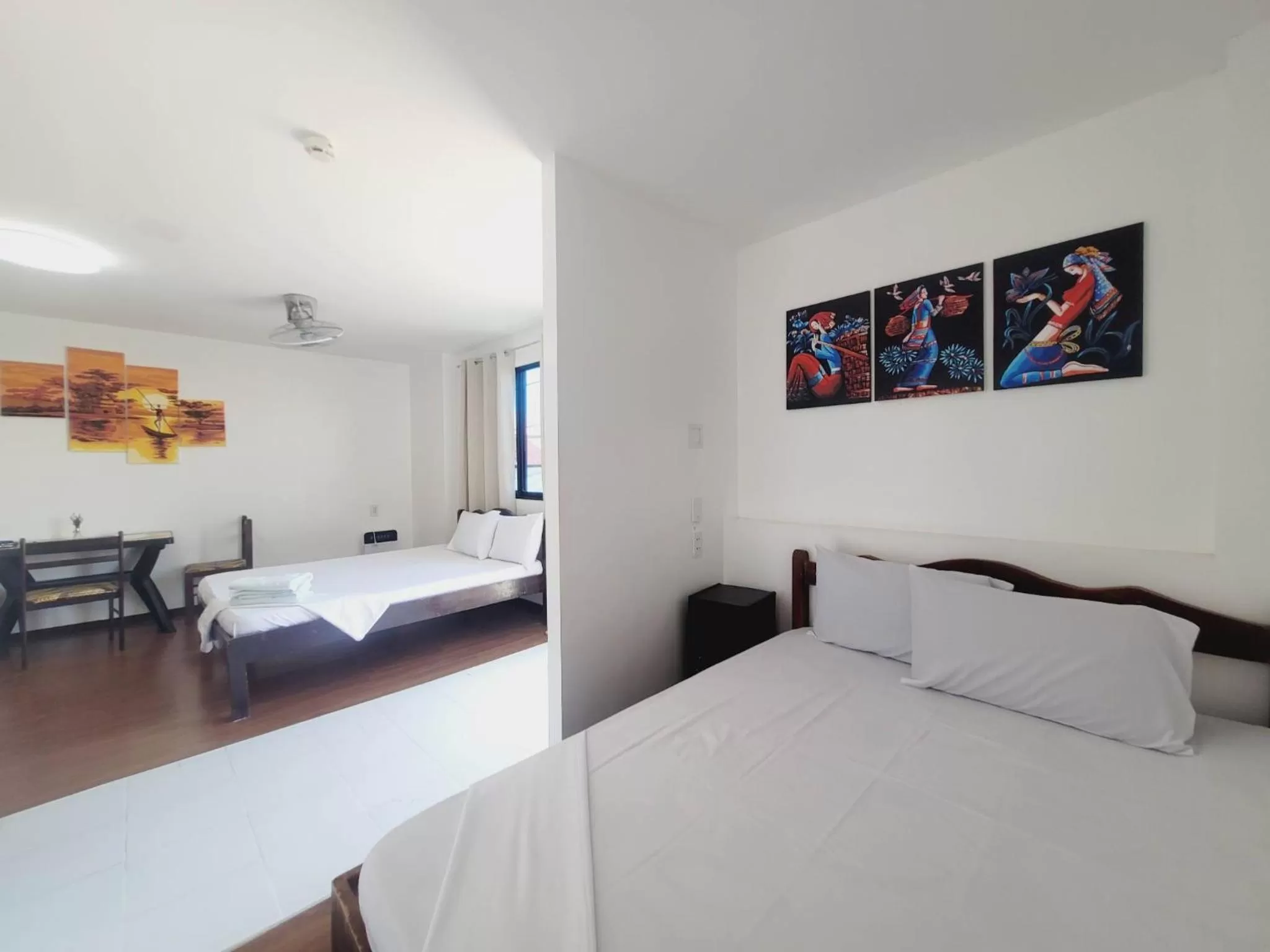 Bed in Gaja Go Dive & Inn