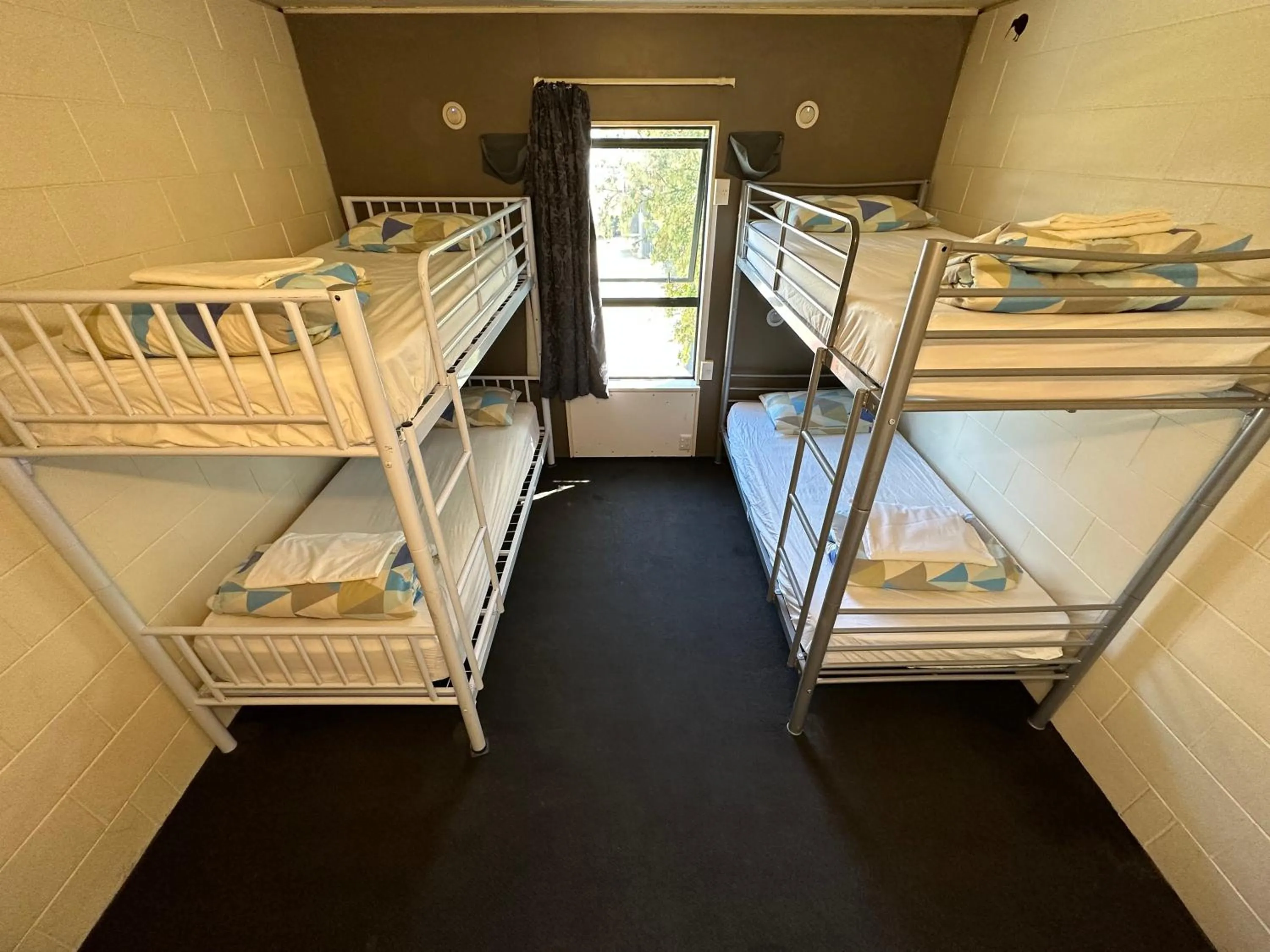 Bed in Around The World Backpackers