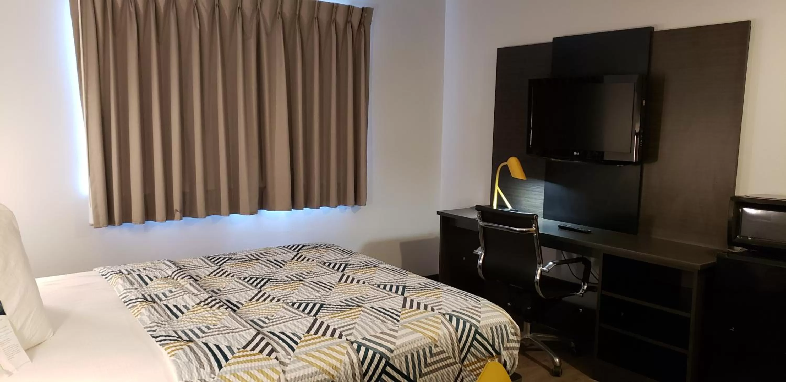 Bed in Motel 6-Kewanee, IL