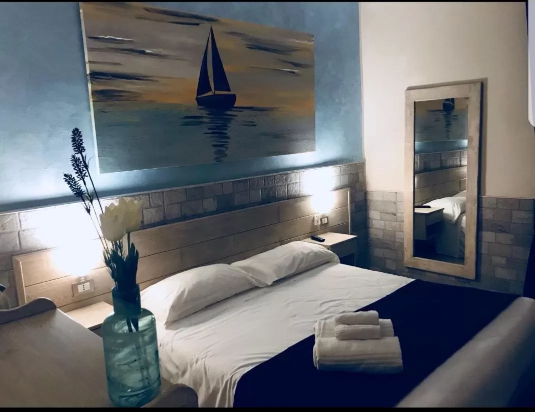 Bed in Fiumicino Airport B&B Deluxe