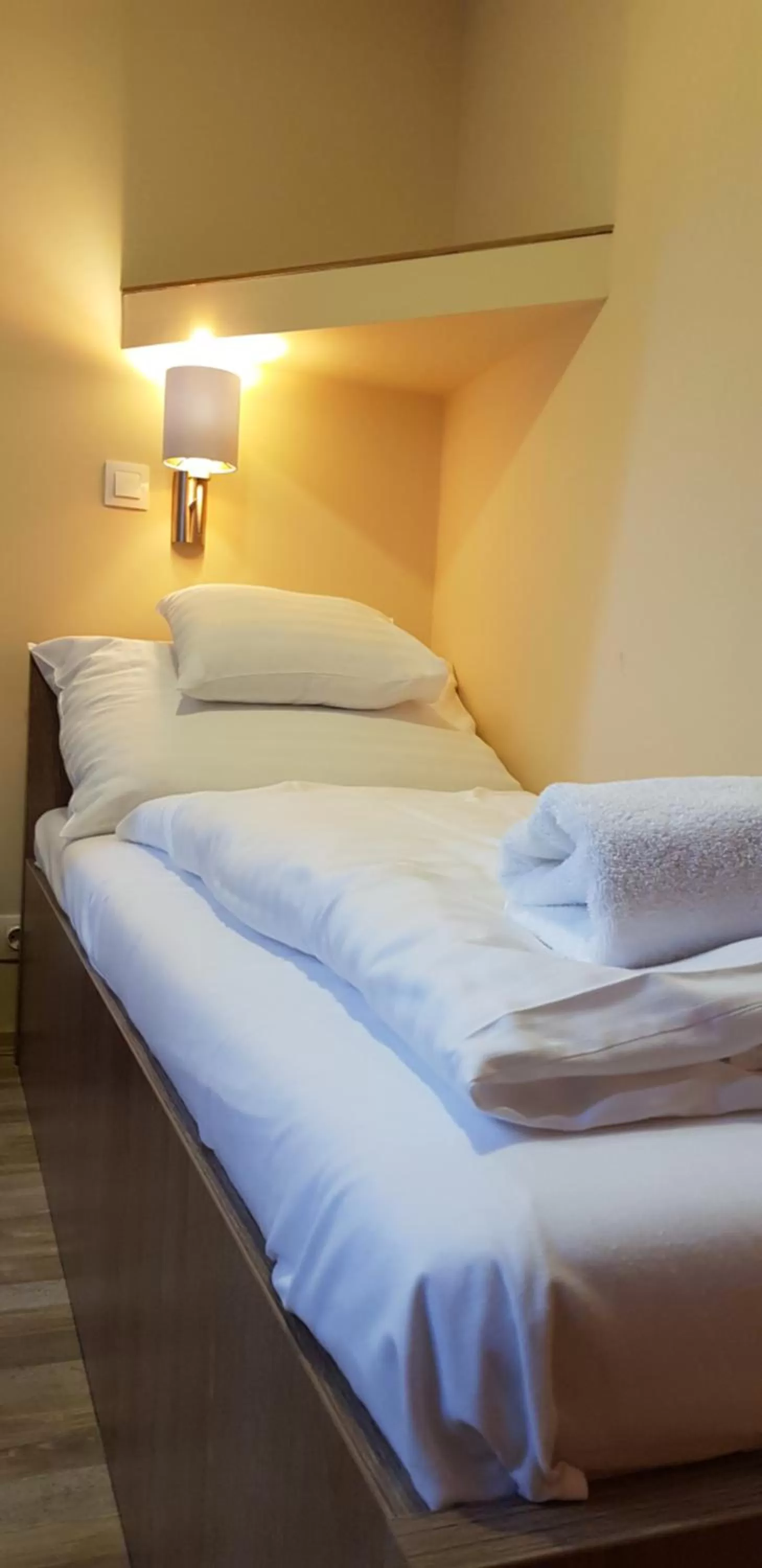 Bed in Central Panzió Gyula