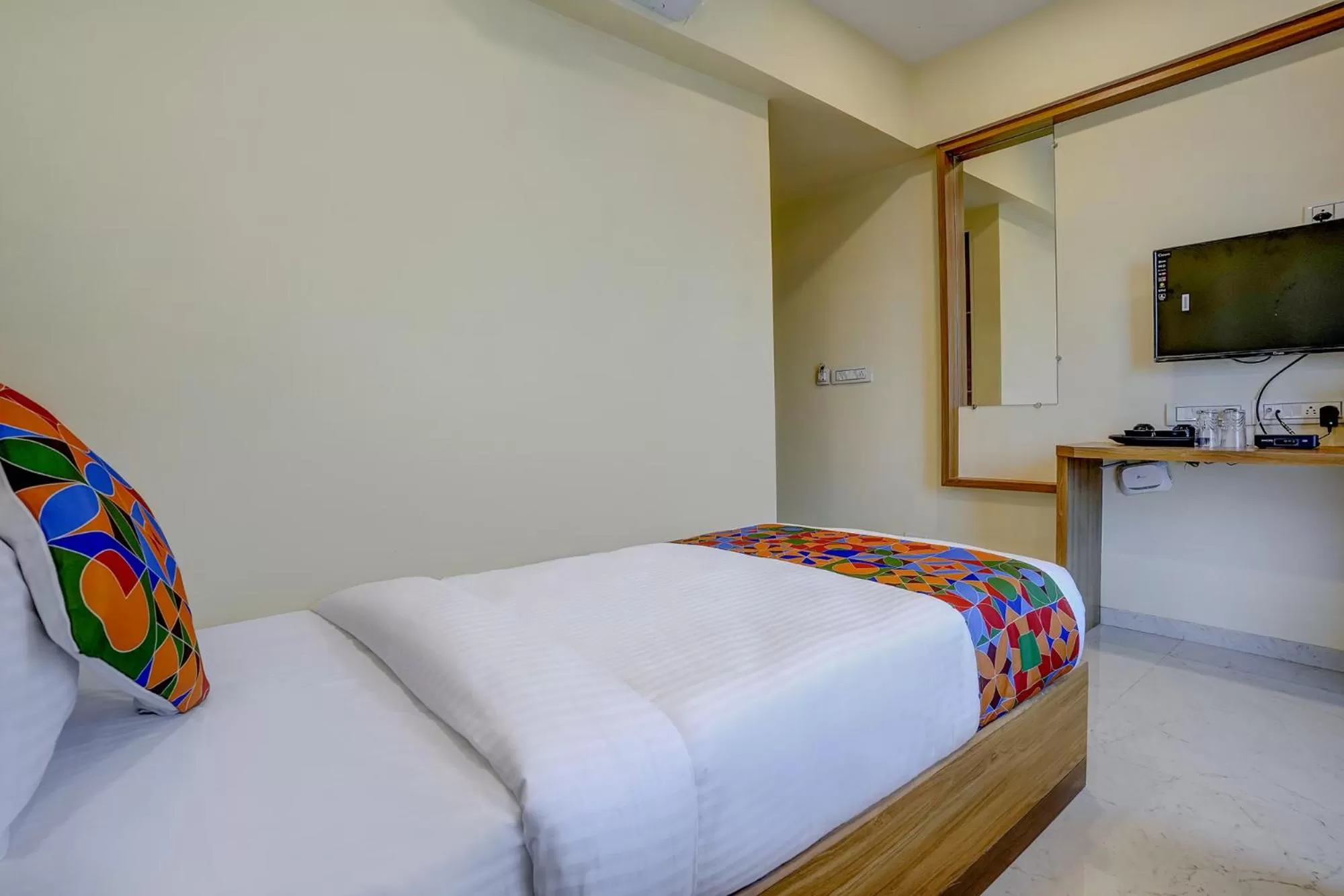 Bed in FabHotel Crystal Homes - nr Rajaram Bhiku stadium