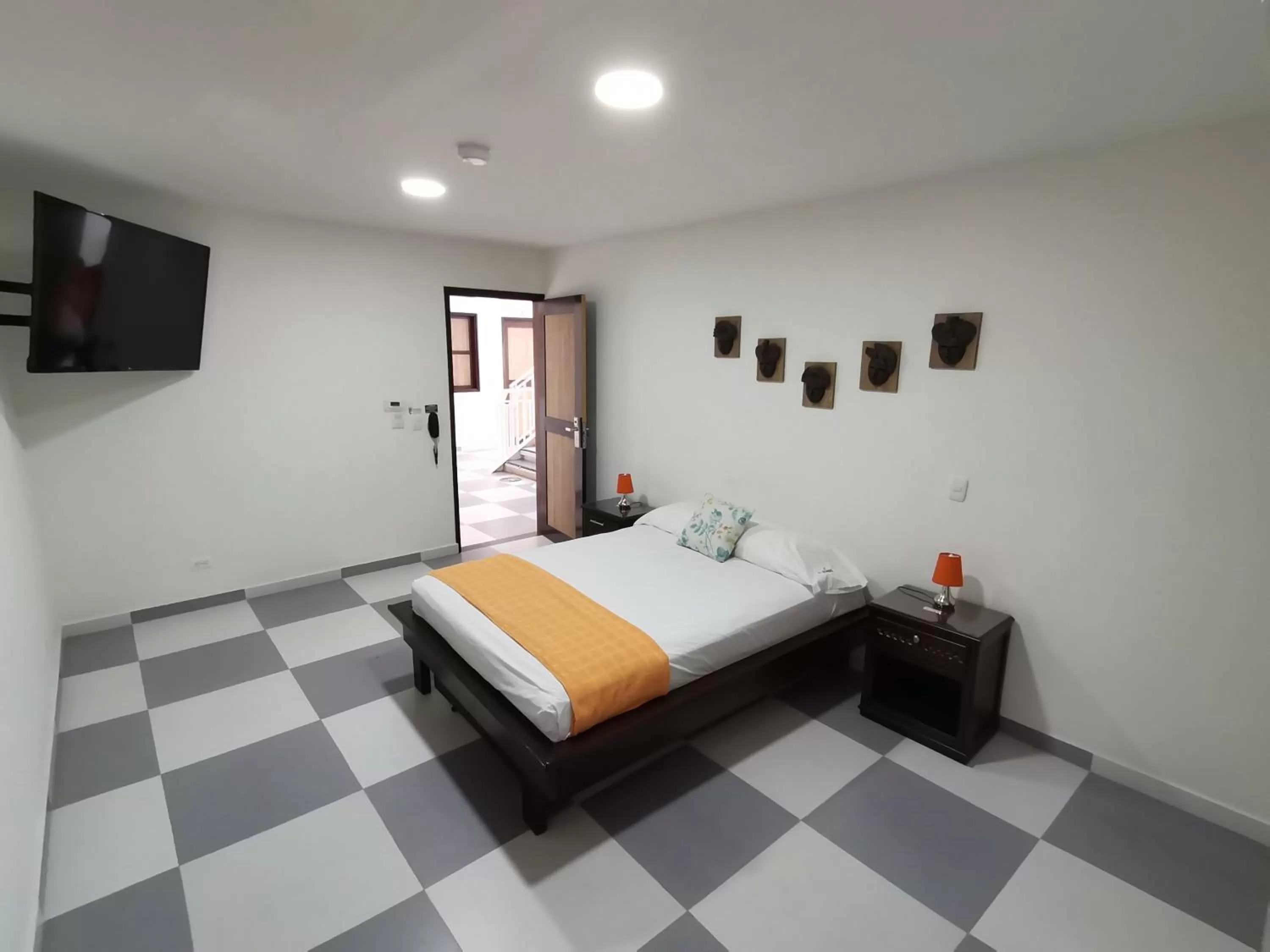 Bed in Hotel El Olimpo