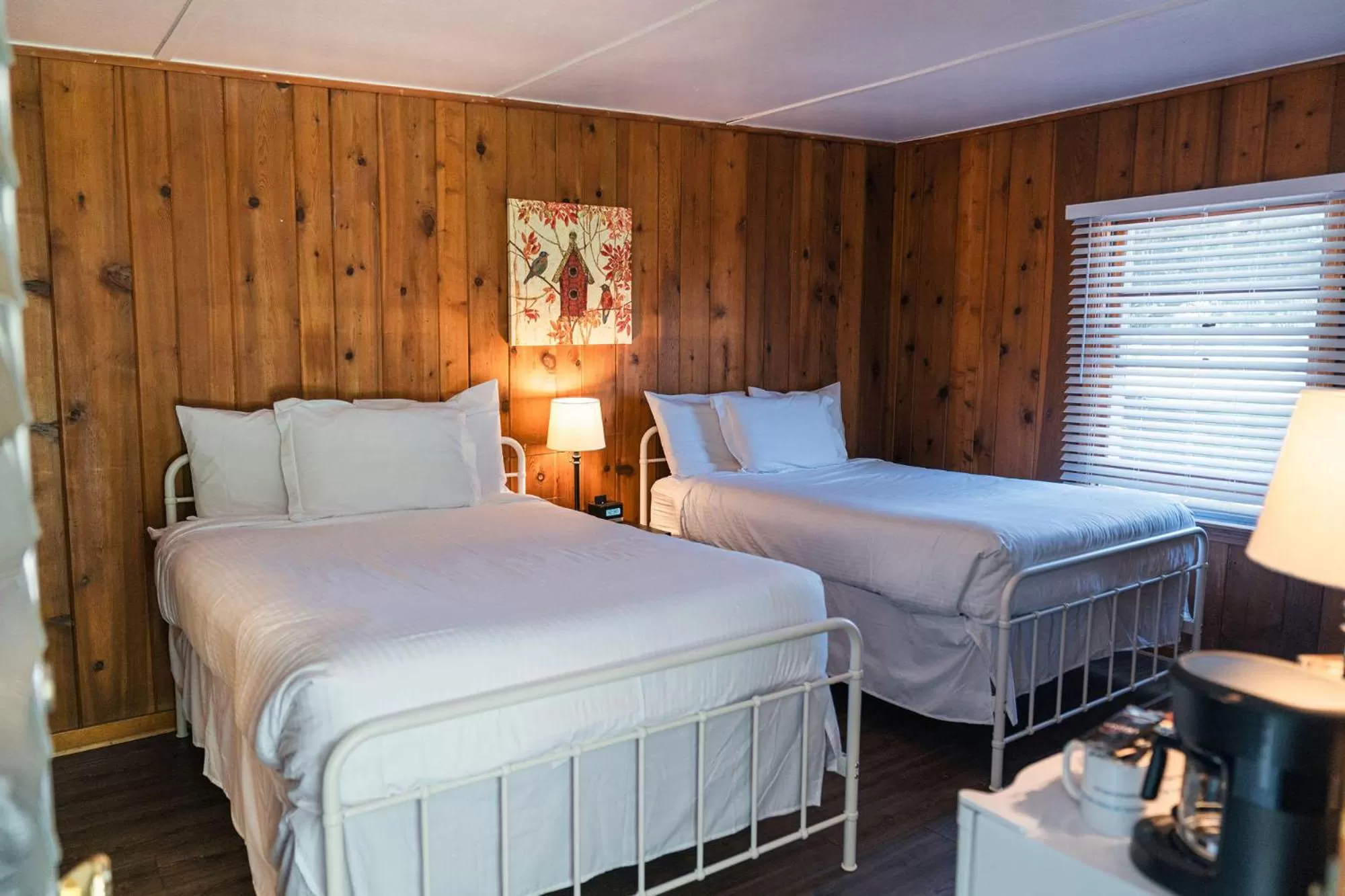 Bed in Whispering Winds Motel