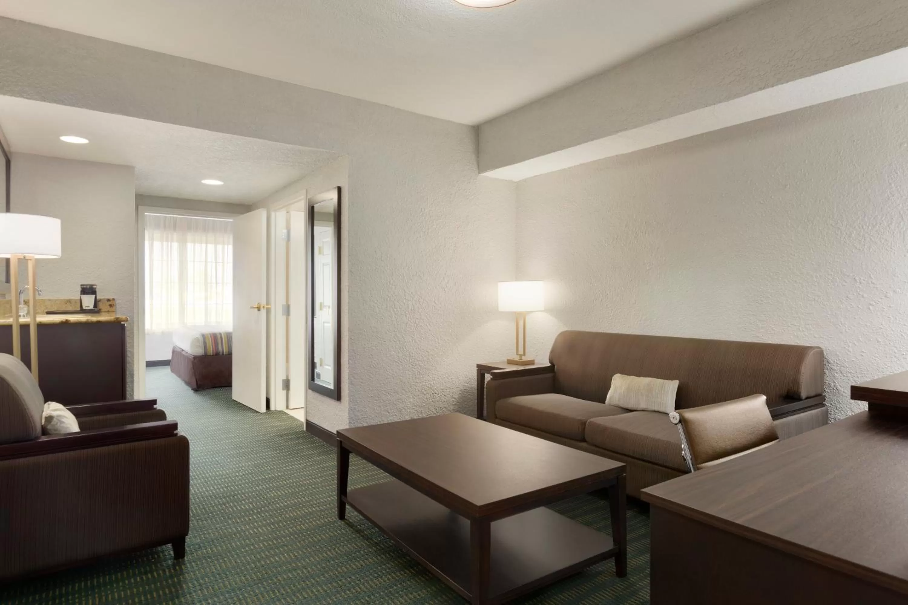 Living room in SureStay Plus Hotel by Best Western Vero Beach
