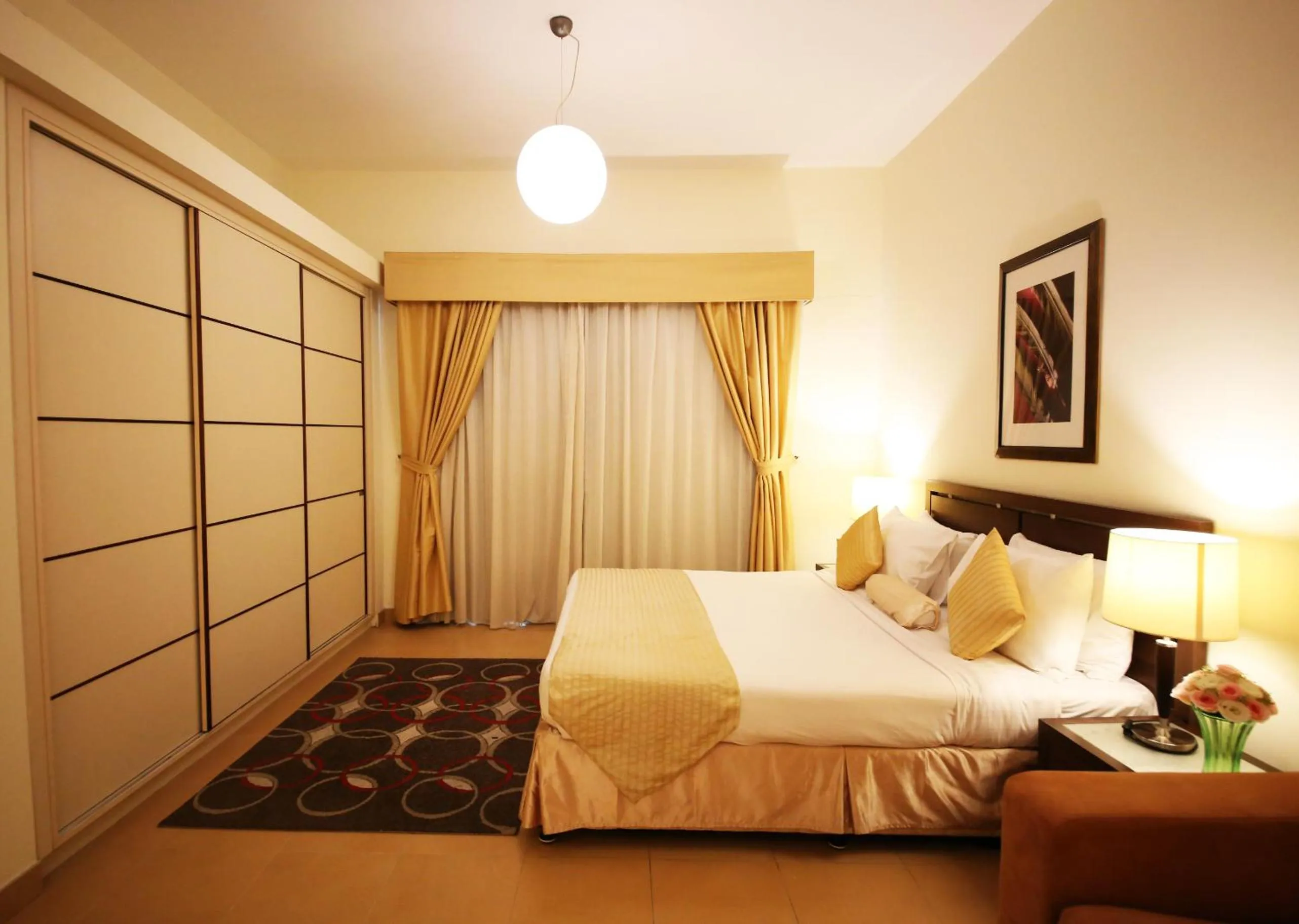 Bed in Tulip Hotel Apartments