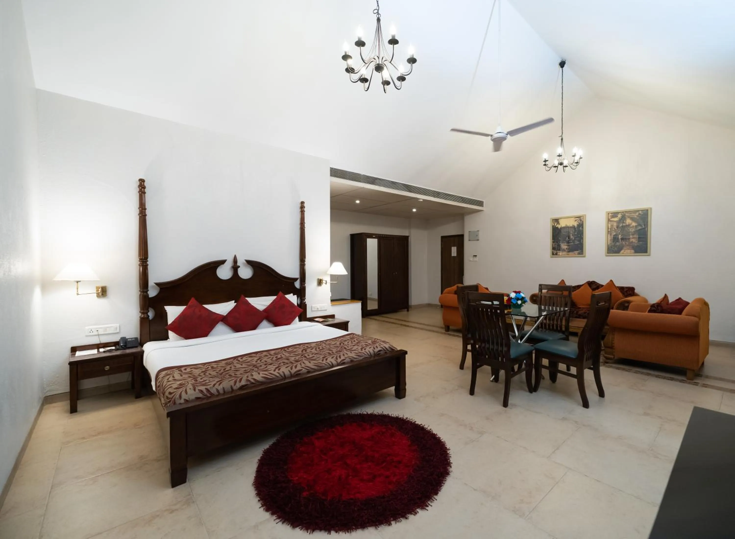 Living room, Bed in Neelam's The Grand Hotel Goa