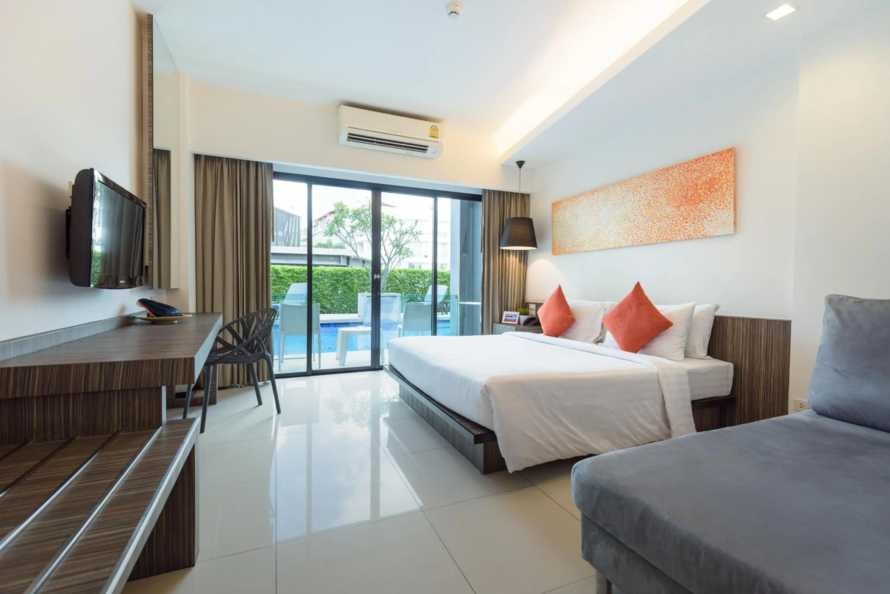 Bed in Hotel J Residence Pattaya